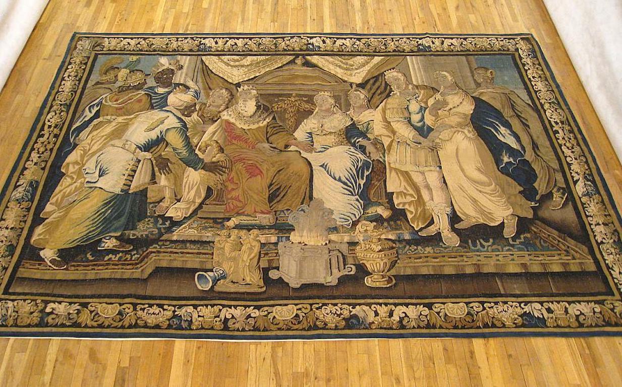A French Aubusson Biblical tapestry from the late 17th century, depicting King Solomon and the Queen of Sheba seated on a throne at center, flanked on either side by attendants, to the right by a further royal pair and to the left by a visiting