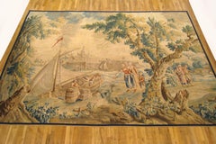 Tapisserie rustique d'Aubusson de la fin du XVIIe siècle représentant un bateau déchargeant sa cargaison