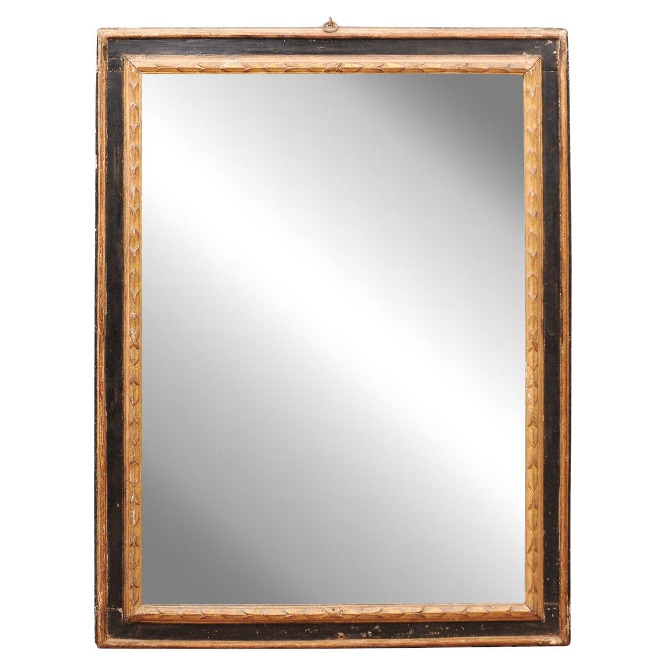 Miroir rectangulaire peint, doré et ébonisé, Toscane, fin du XVIIe siècle en vente