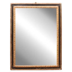 Miroir rectangulaire peint, doré et ébonisé, Toscane, fin du XVIIe siècle