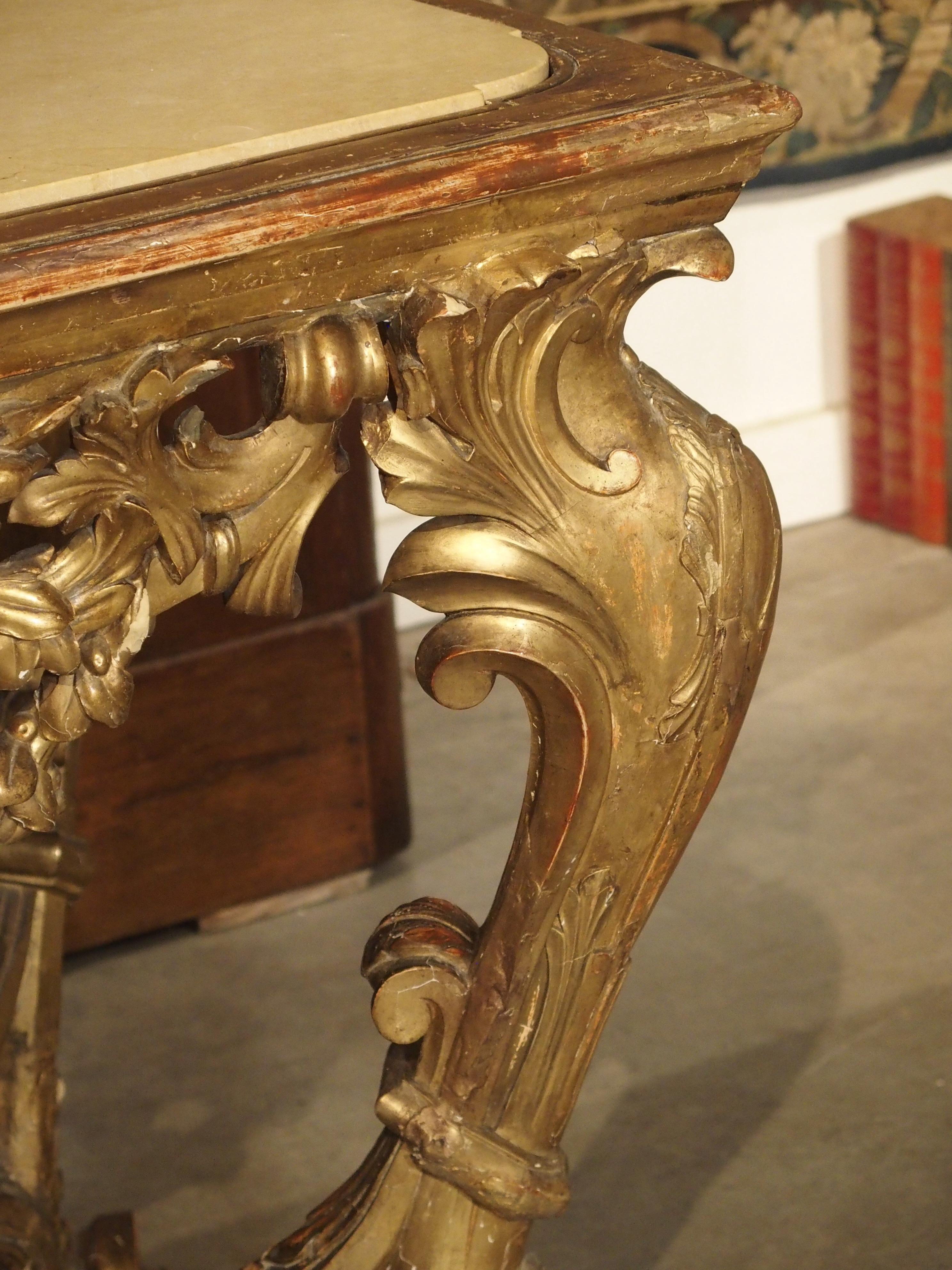 Hand-Carved Late 17th Century Italian Giltwood Console Table with Inset Marble Top For Sale