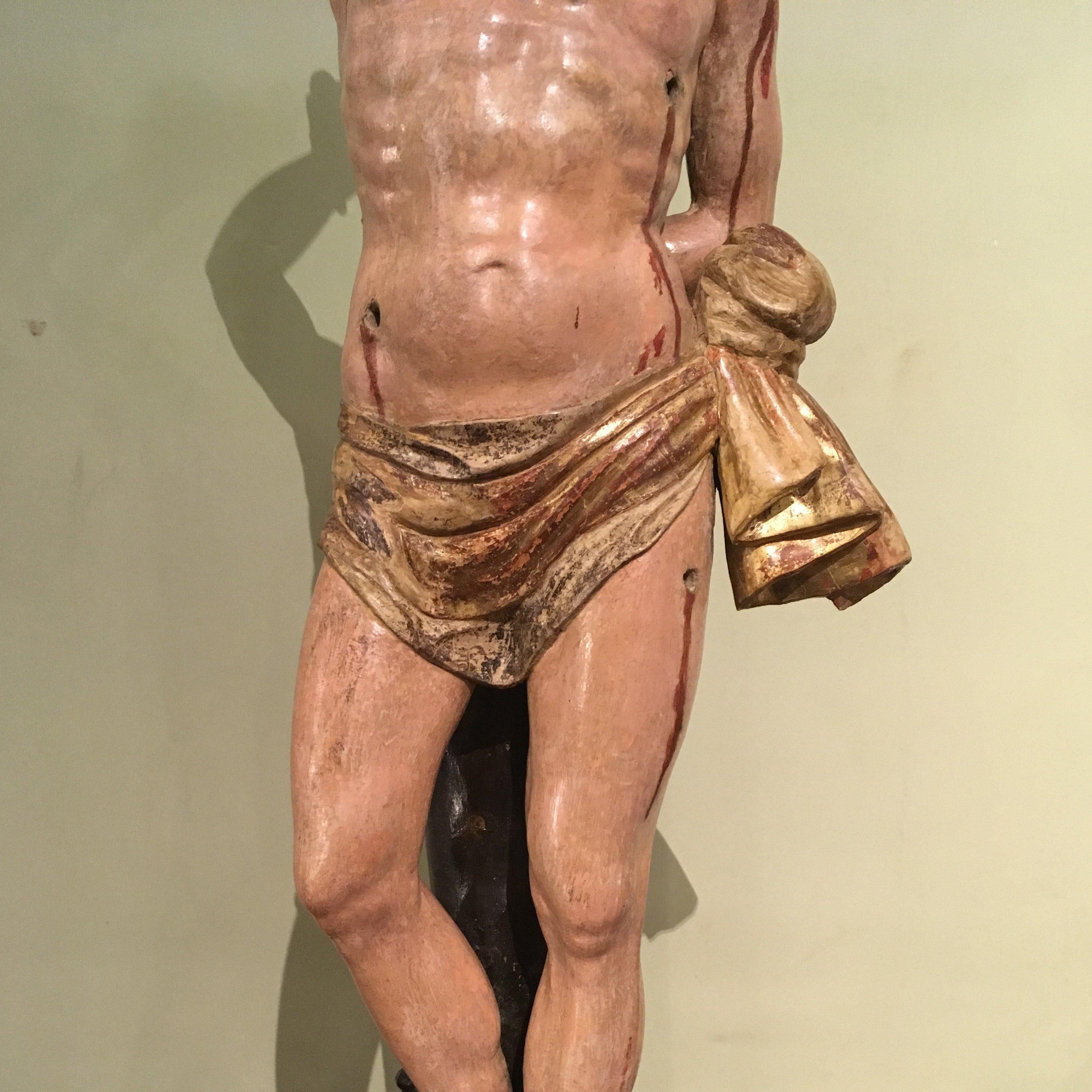 A stunning hand carved wooden sculpture depicting Saint Sebastian.
The sculptures has been cleaned recently and presents its original painted surface.
School of Tuscany, late 17th century.