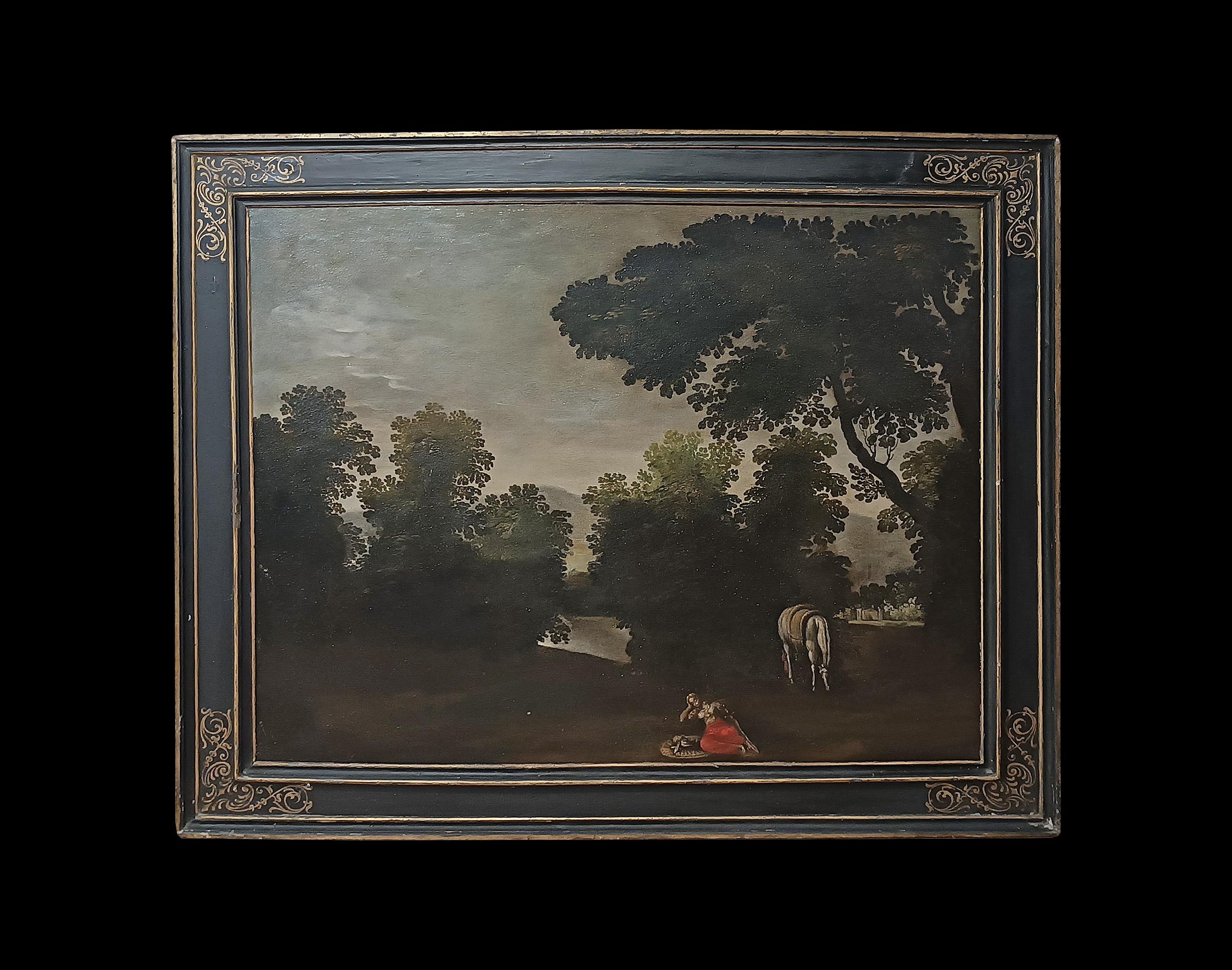 Beautiful oil painting on canvas, set in a contemporary carved, ebonized, and gilded wooden frame. The painting depicts a somewhat shady landscape, with trees and a thick meadow. A small figure stands out in the foreground: a reclining woman