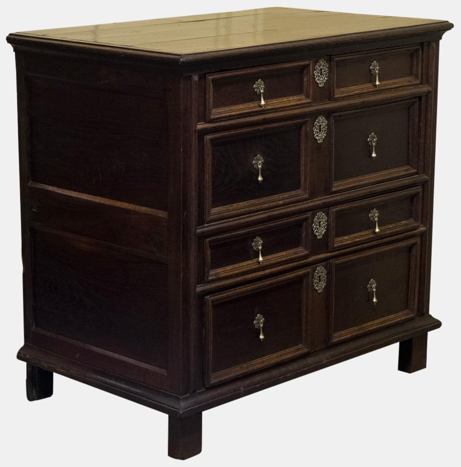 A late 17th century oak chest of drawers with molded drawer fronts,

circa 1680.