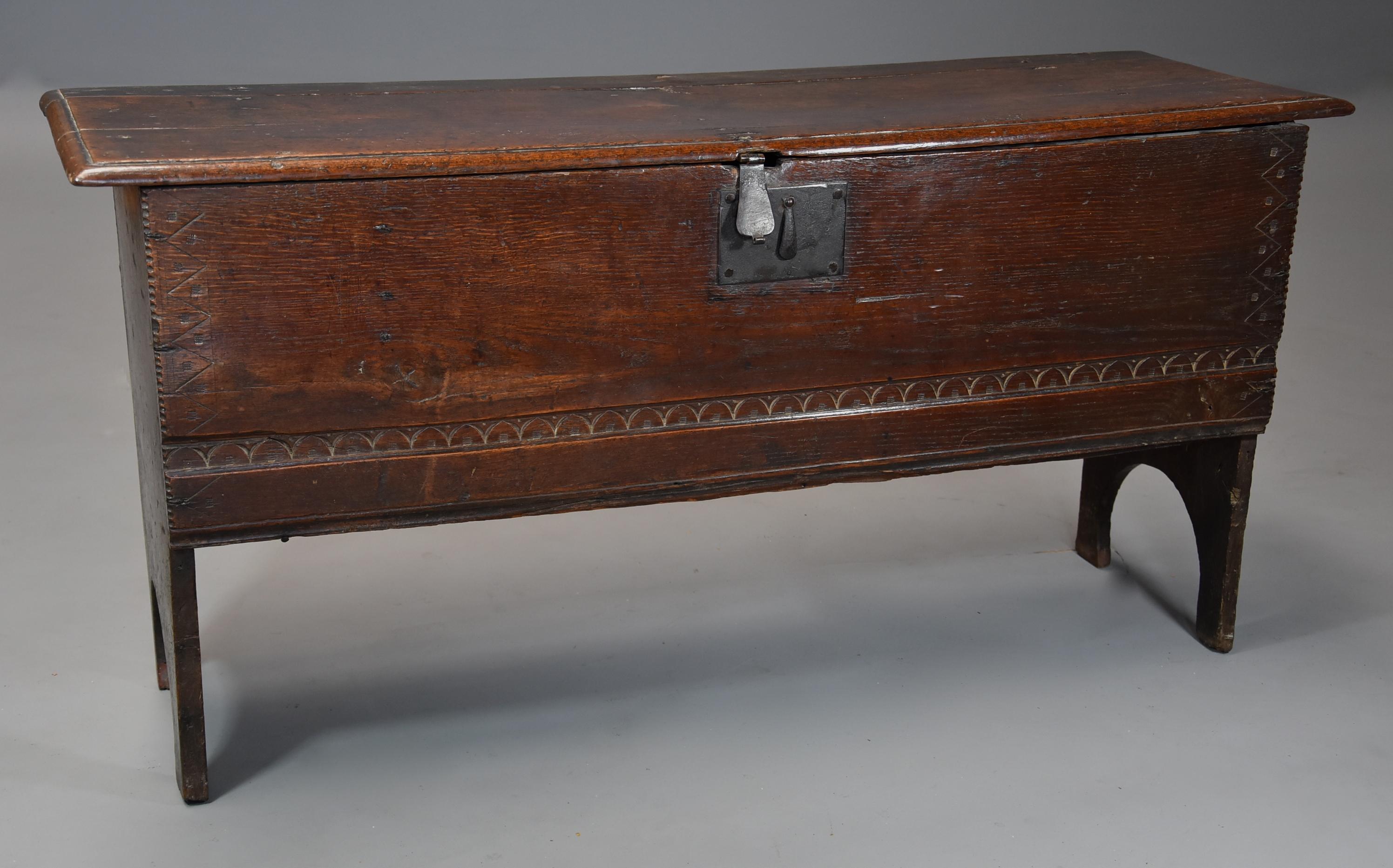 A late 17th century (circa 1690) oak six plank coffer with excellent patina (color) and of small, narrow proportions.

This coffer consists of a solid oak top of fine patina with a moulded edge with original steel catch and hinges, the lid opening