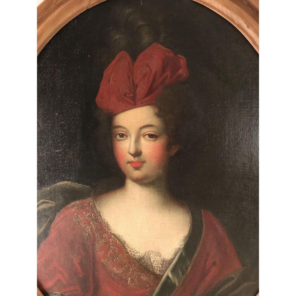 An oil on canvas portrait of a young French courtier, circa 1690.

This evocative antique French school picture has been attributed to the portrait painter Jean-François de Troy (1679-1752).
De Troy was famous as a portrait painter of fashionable