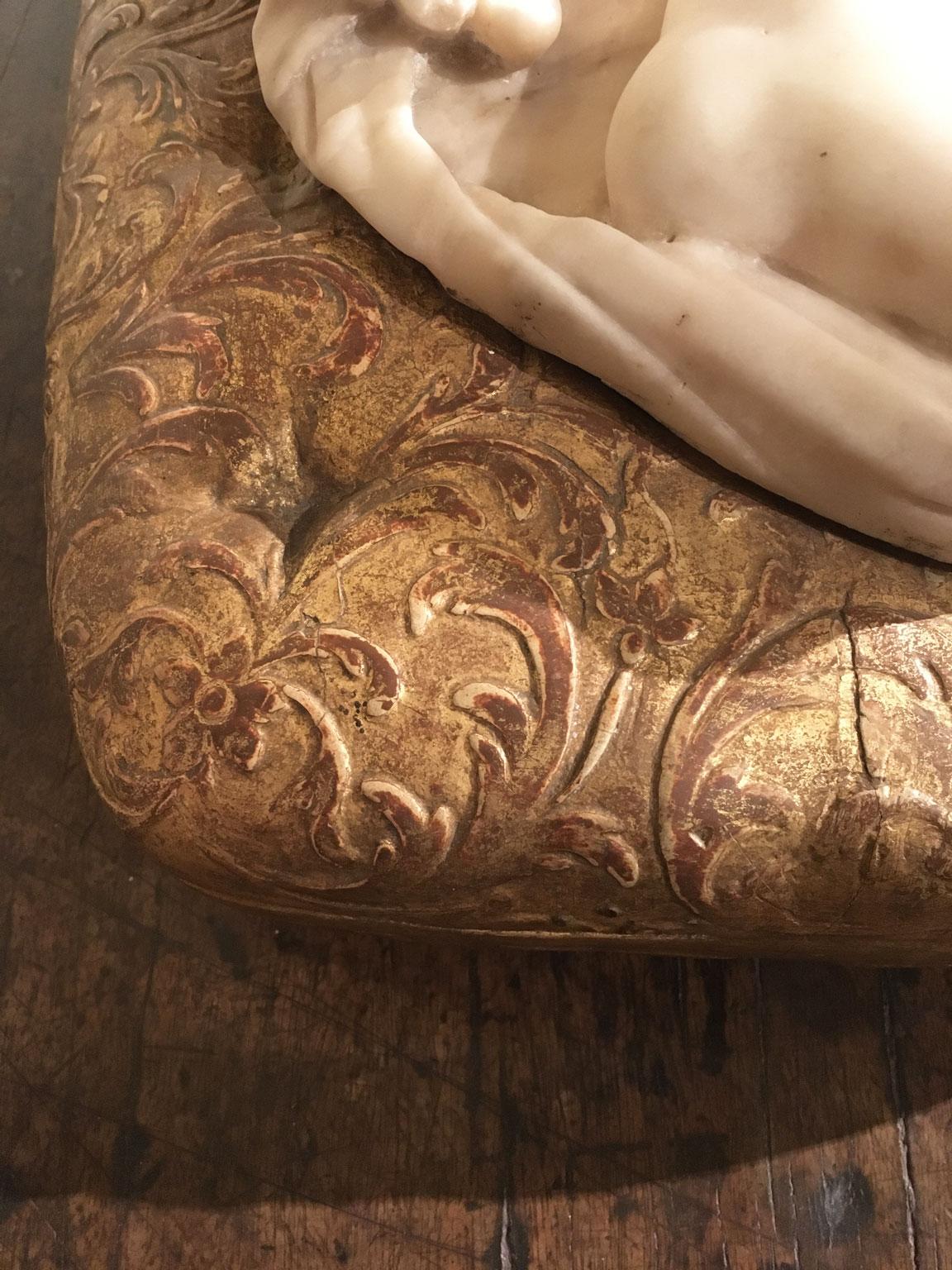 Late 17th Century White Marble Carved Child Nude Cupid Sculpture on Gilded Base For Sale 7