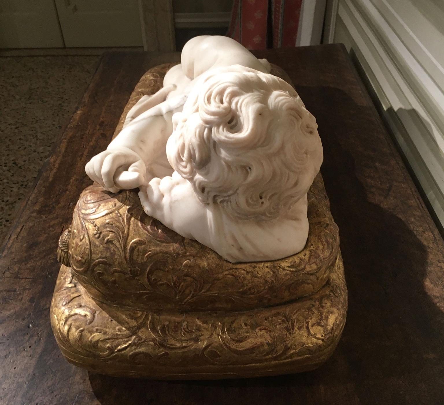Late 17th Century White Marble Carved Child Nude Cupid Sculpture on Gilded Base For Sale 2