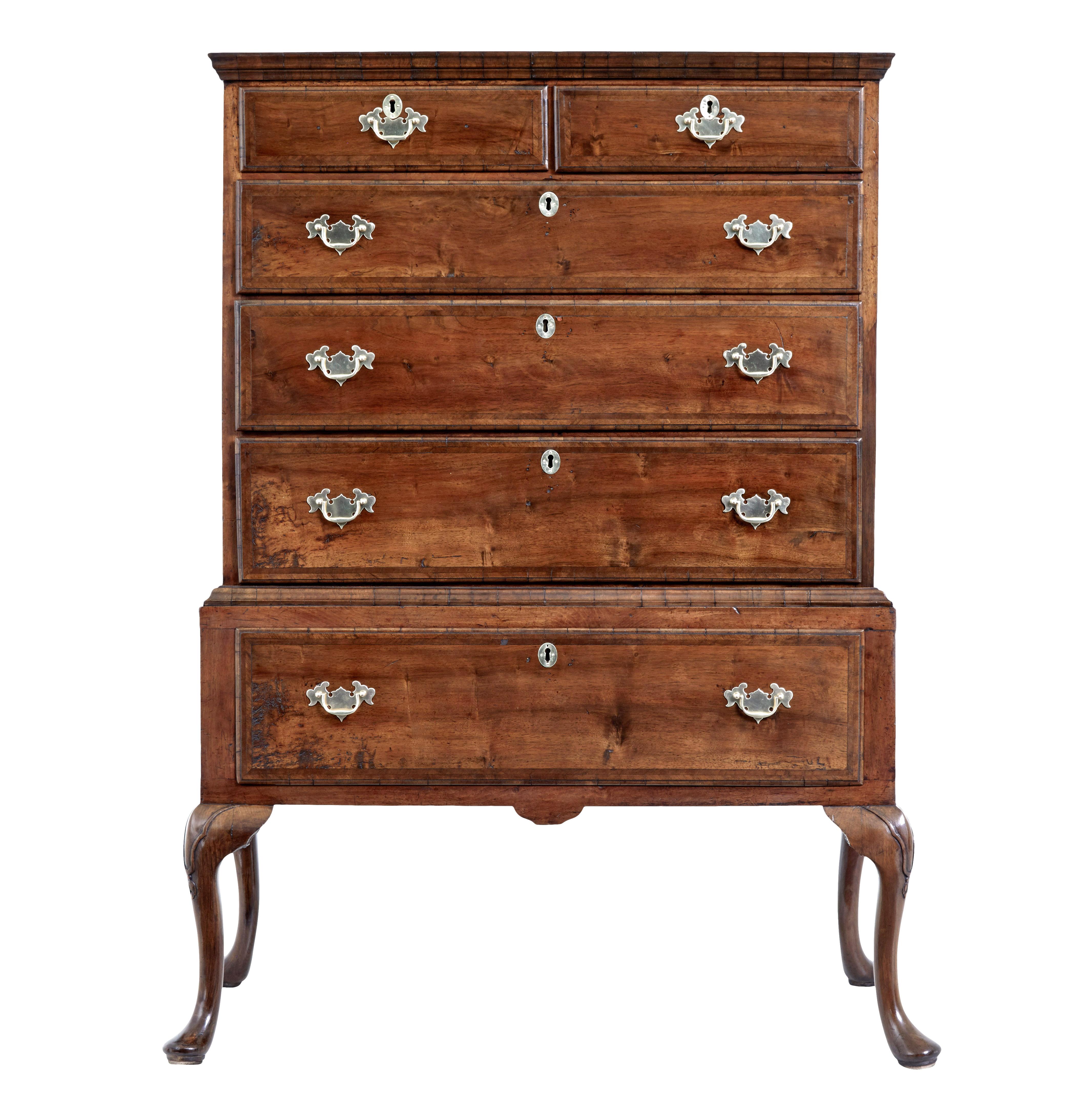 Late 17th century William and Mary walnut chest on stand circa 1690.

Good quality 2 piece William and Mary period chest on original base.

Shaped cornice to the top surface with a 2 over 3 drawer layout below. Each drawer cross banded with