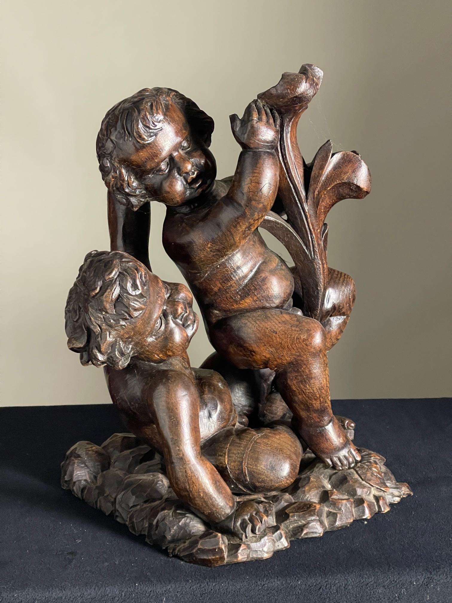 Late 17th century wood carving.

C1690 carving of putti in a playing position on a original rocky base great patination and colour

size 60cms high 44 wide 36 deep
