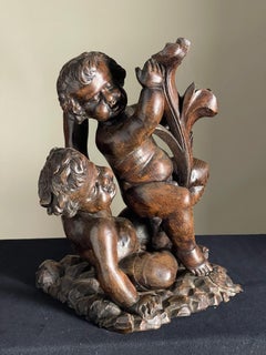 Late 17th century wood carving of Putto