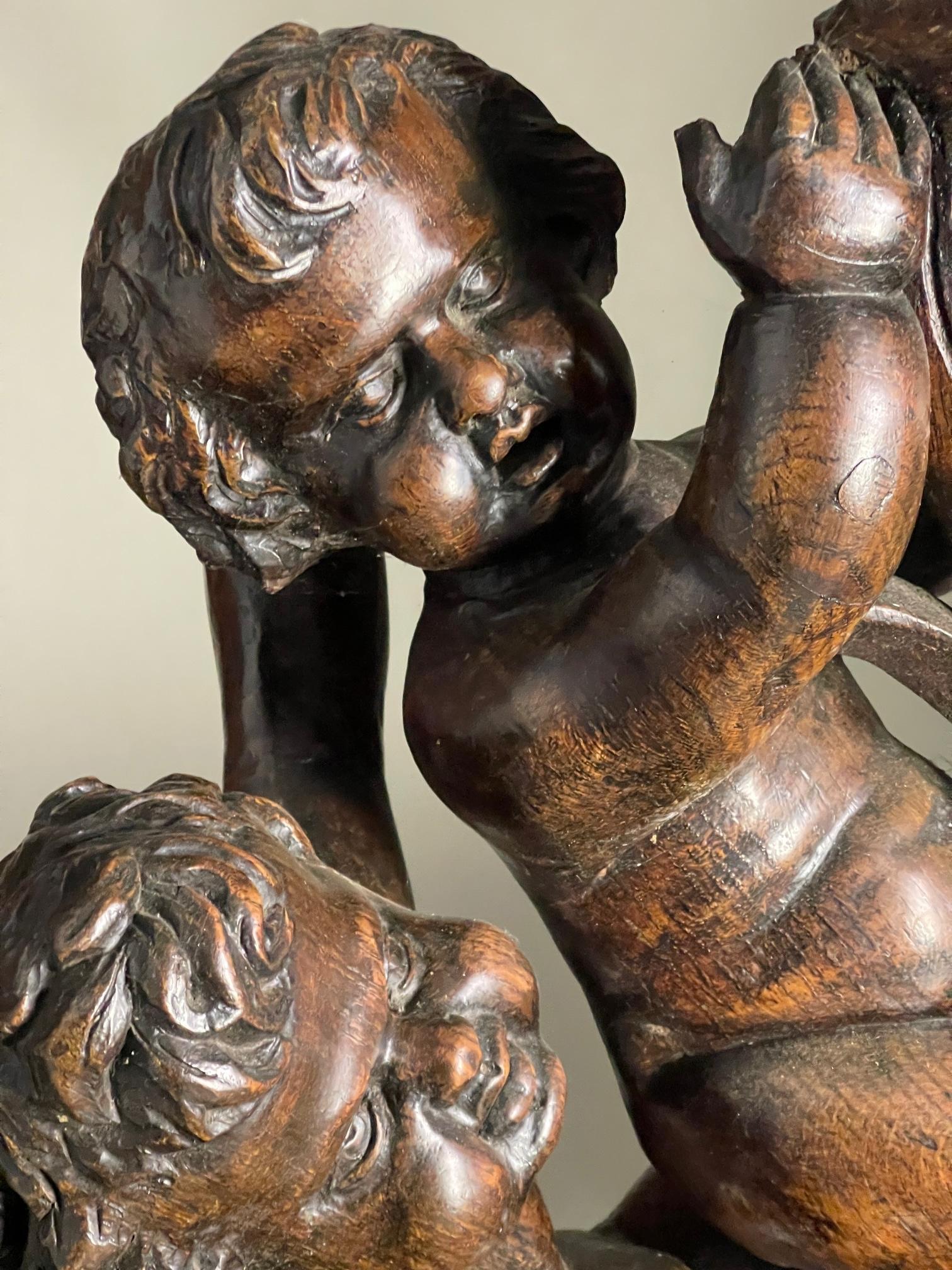 Late 17th century wood carving of Putto In Good Condition For Sale In Bakewell, GB