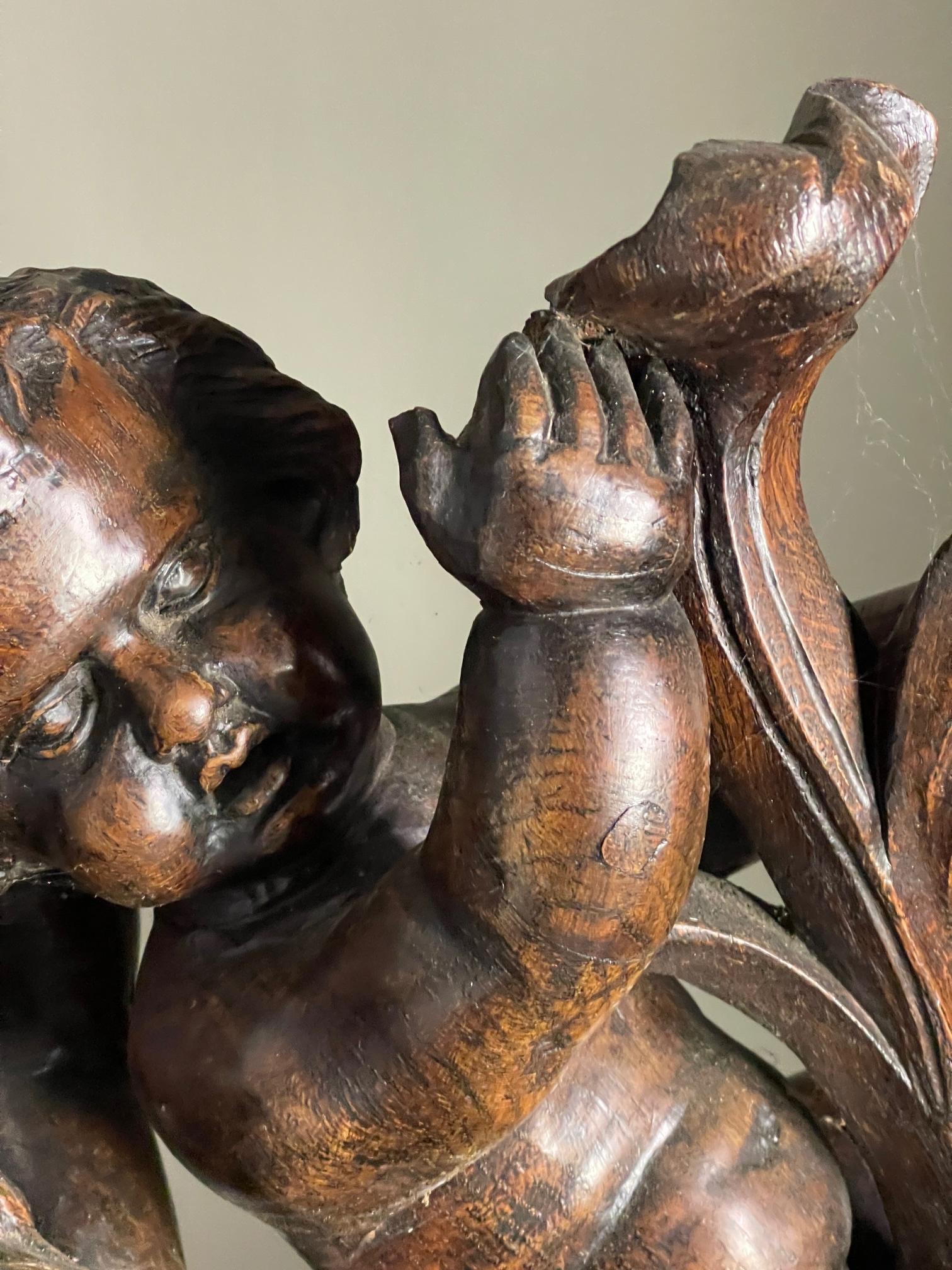 Late 17th century wood carving of Putto For Sale 1