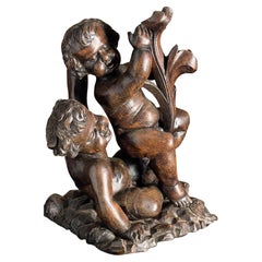 Antique Late 17th century wood carving of Putto