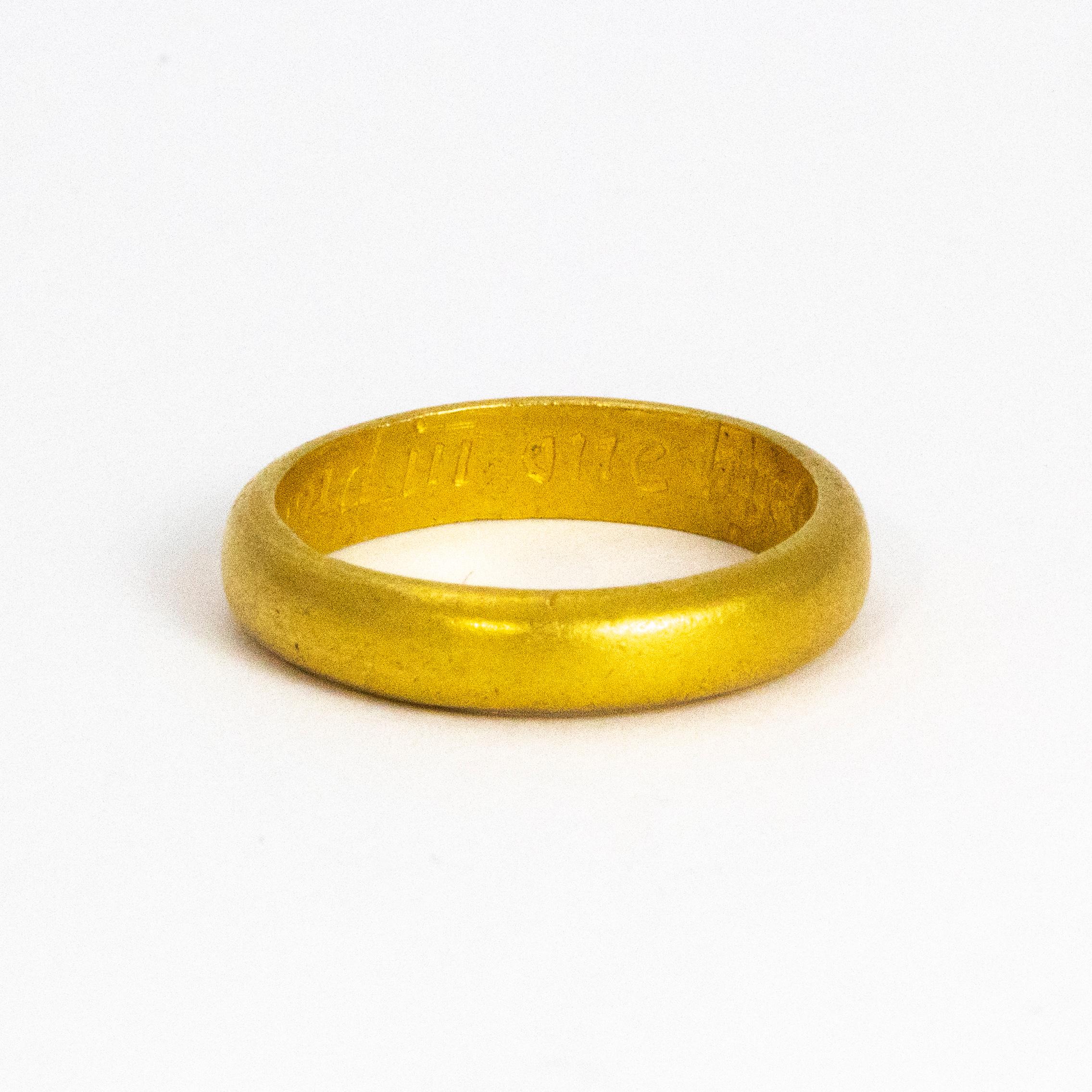 A rare antique posy ring crafted around 1680-1720. The inside of the band is engraved with the inscription 'OYND IN ONE BY CHRIST ALONE'. Modelled in 18 karat yellow gold.

Ring Size: K or 5.5