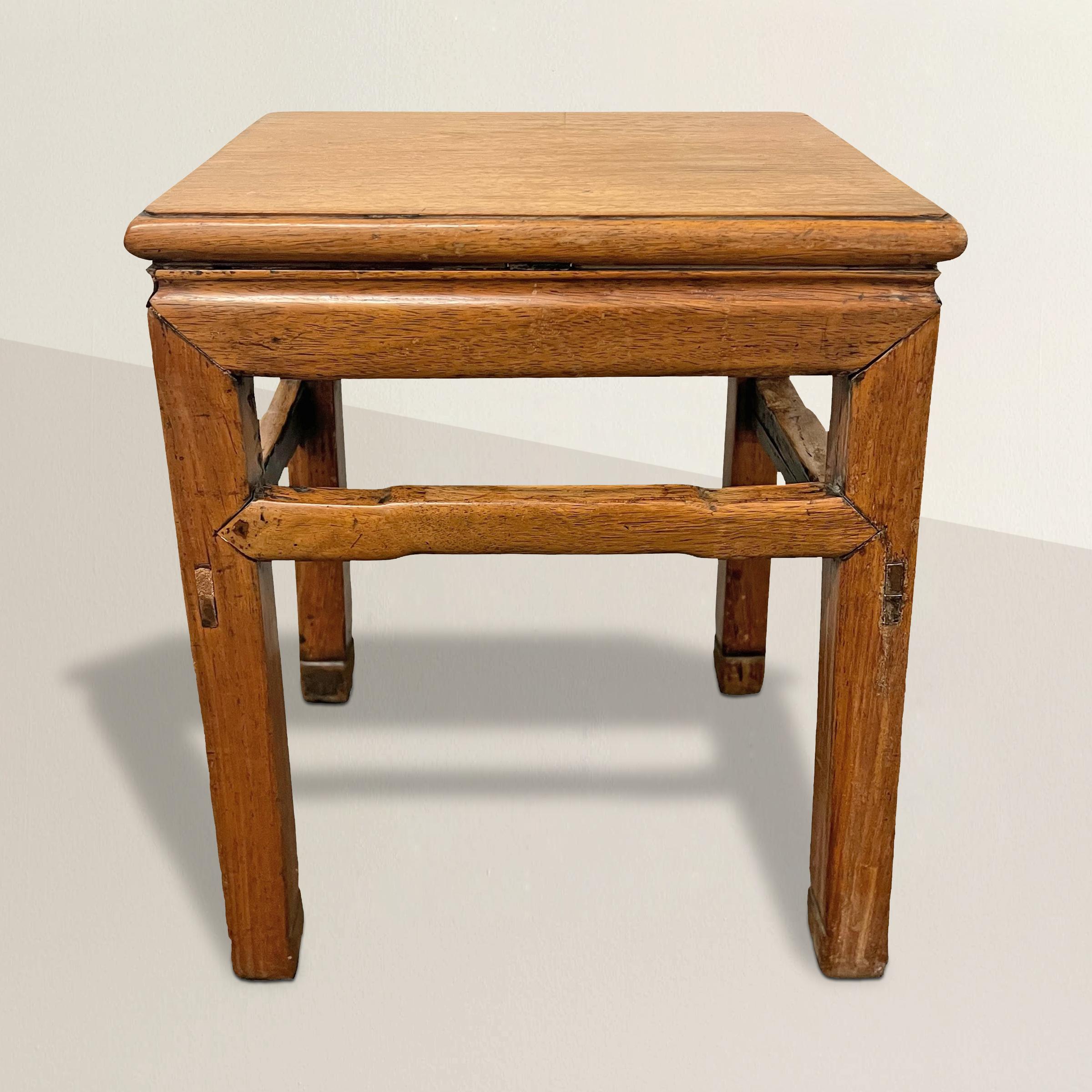 Dating back to the late 17th or early 18th century during China's Qing dynasty, this exquisite Ming-style huanghuali scholar's stool epitomizes the pinnacle of traditional Chinese craftsmanship. Crafted from rare and revered huanghuali wood,