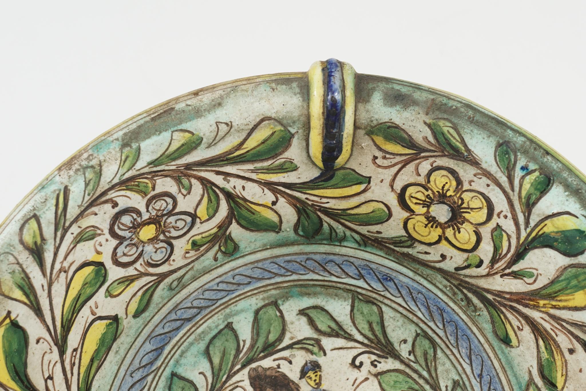 This good sized bowl is a great example of the majolica wares produced in Italy throughout the 15th, 16th, 17, and 18th centuries. Humble and simple but highly decorative and entertaining in nature these pieces are often simply decorated in colors