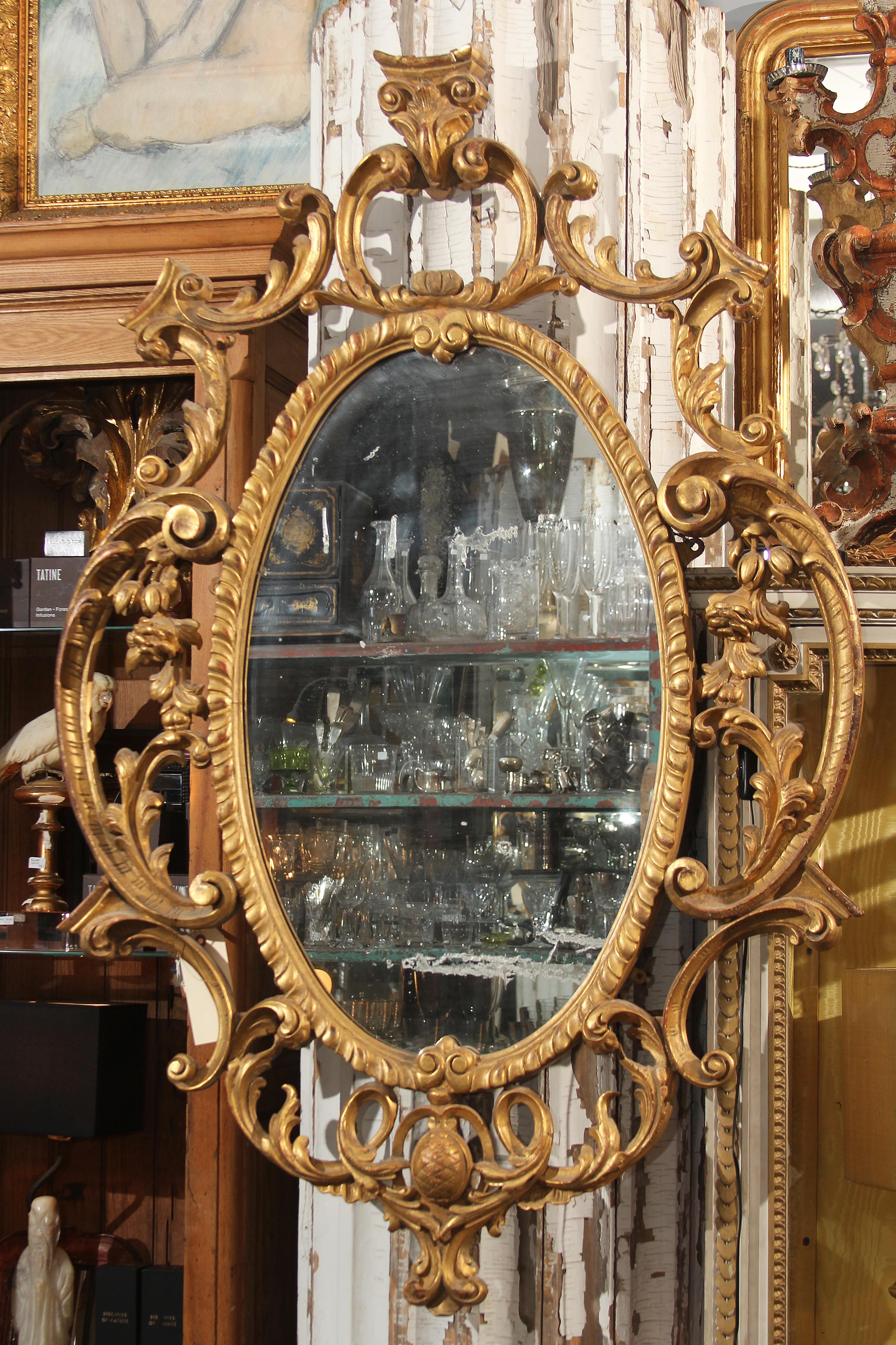 European Late 18th Century Ornate Carved Wood and Gilt Mirror