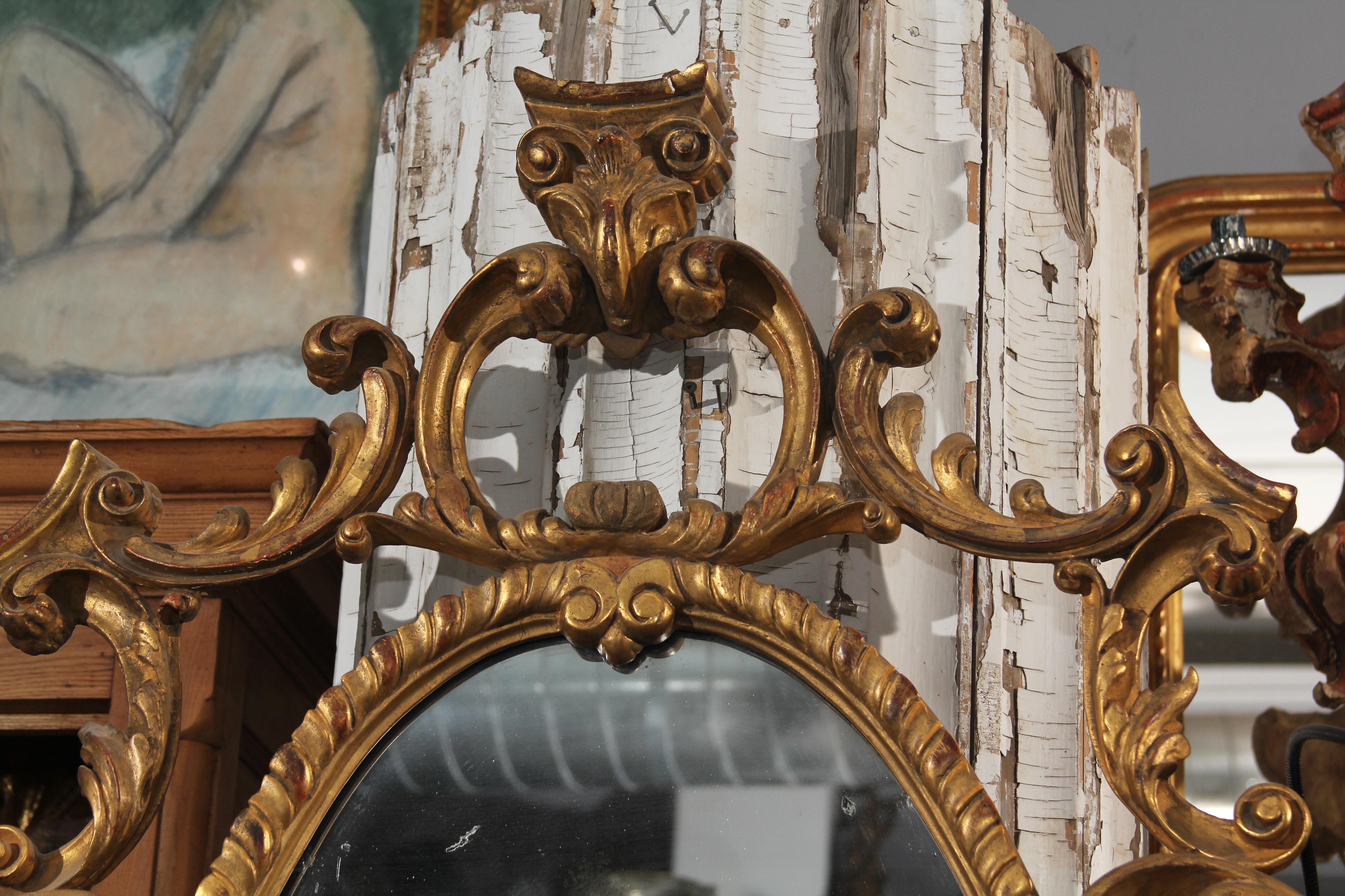 Giltwood Late 18th Century Ornate Carved Wood and Gilt Mirror
