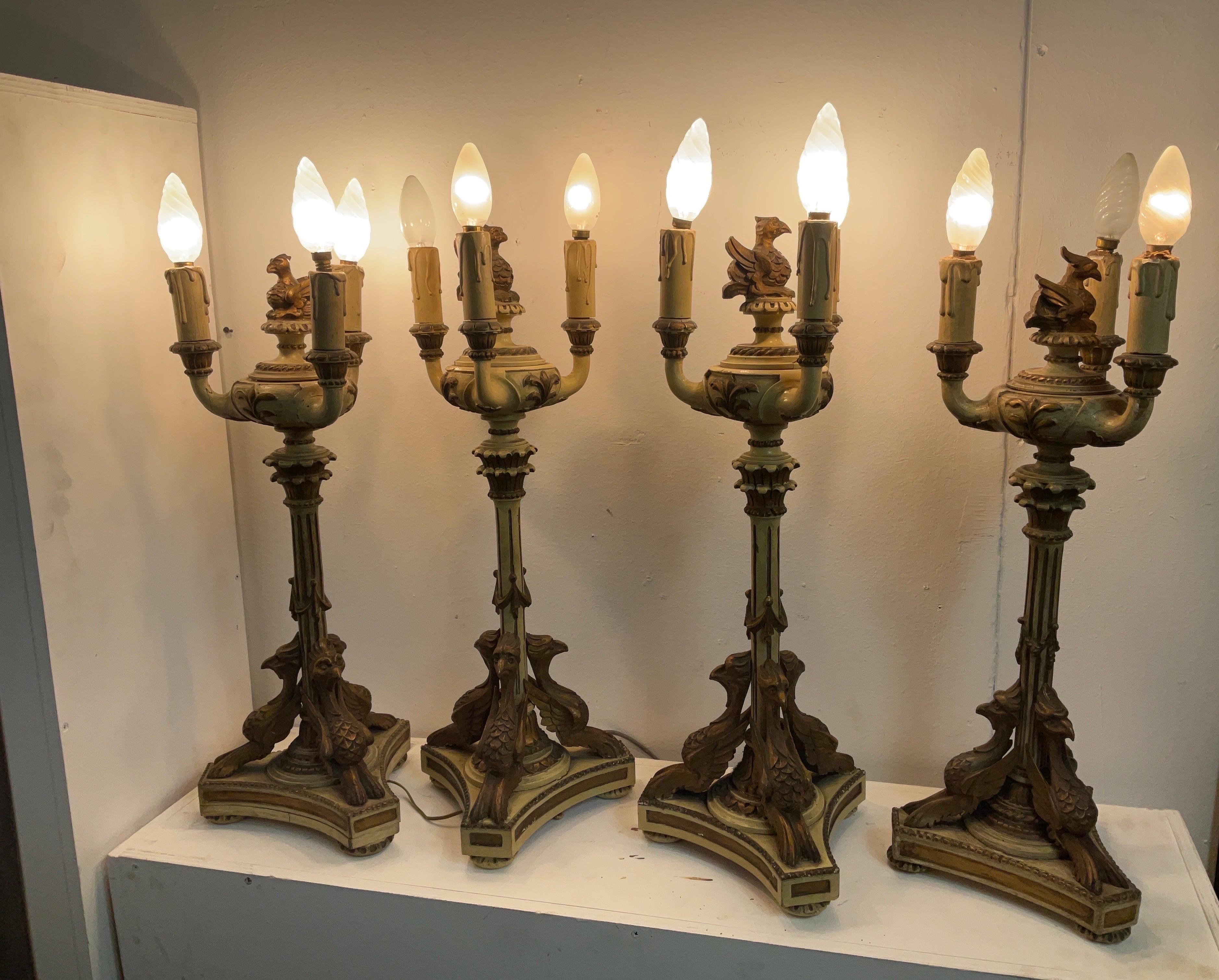 French Late 1800 Empire Style Empire-style lacquered and gilded wood candlesticks For Sale