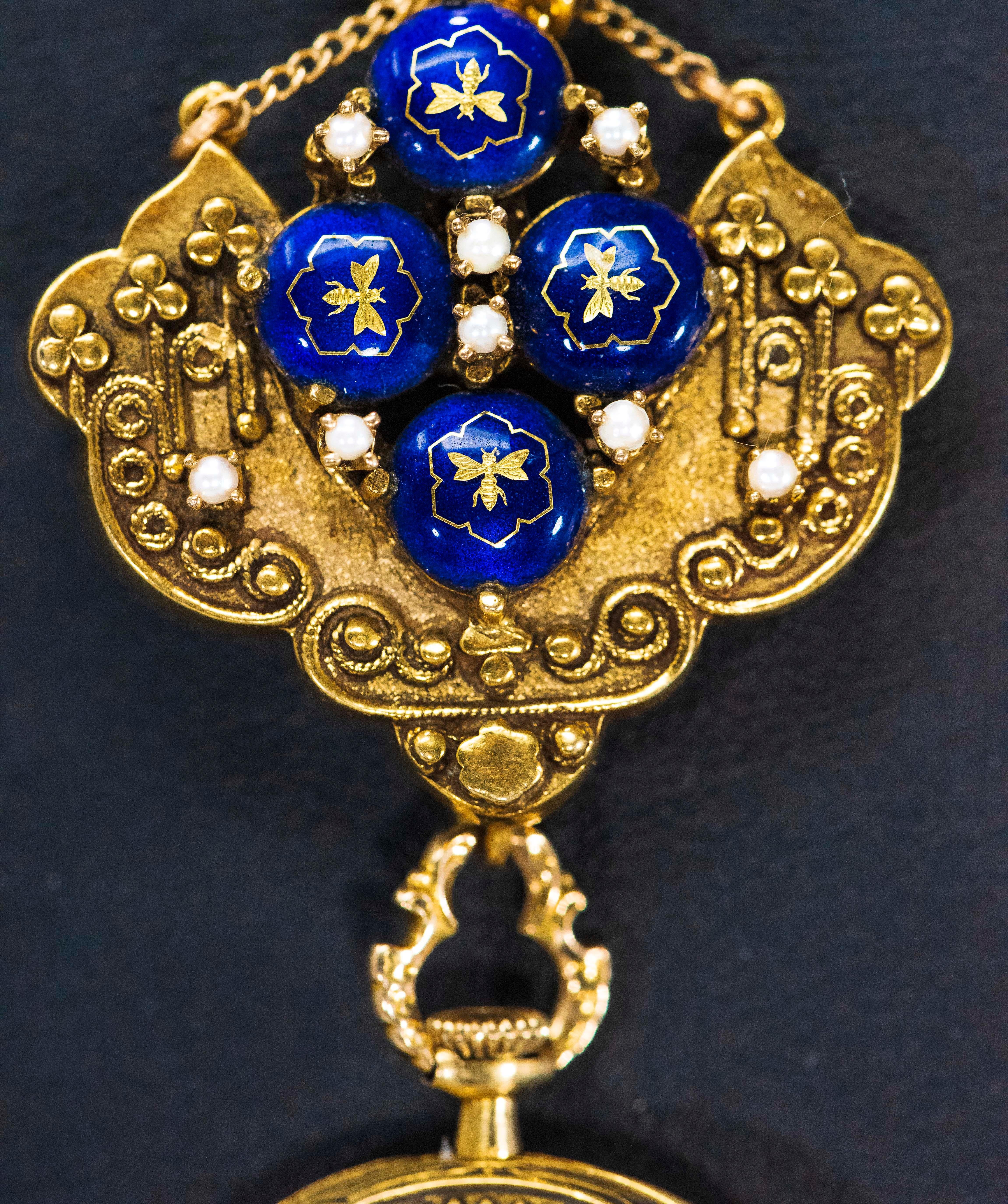 Late 1800s Egyptian Revival Pearl Enamel Diamond Longines Pendant Brooch Watch In Good Condition For Sale In New york, NY