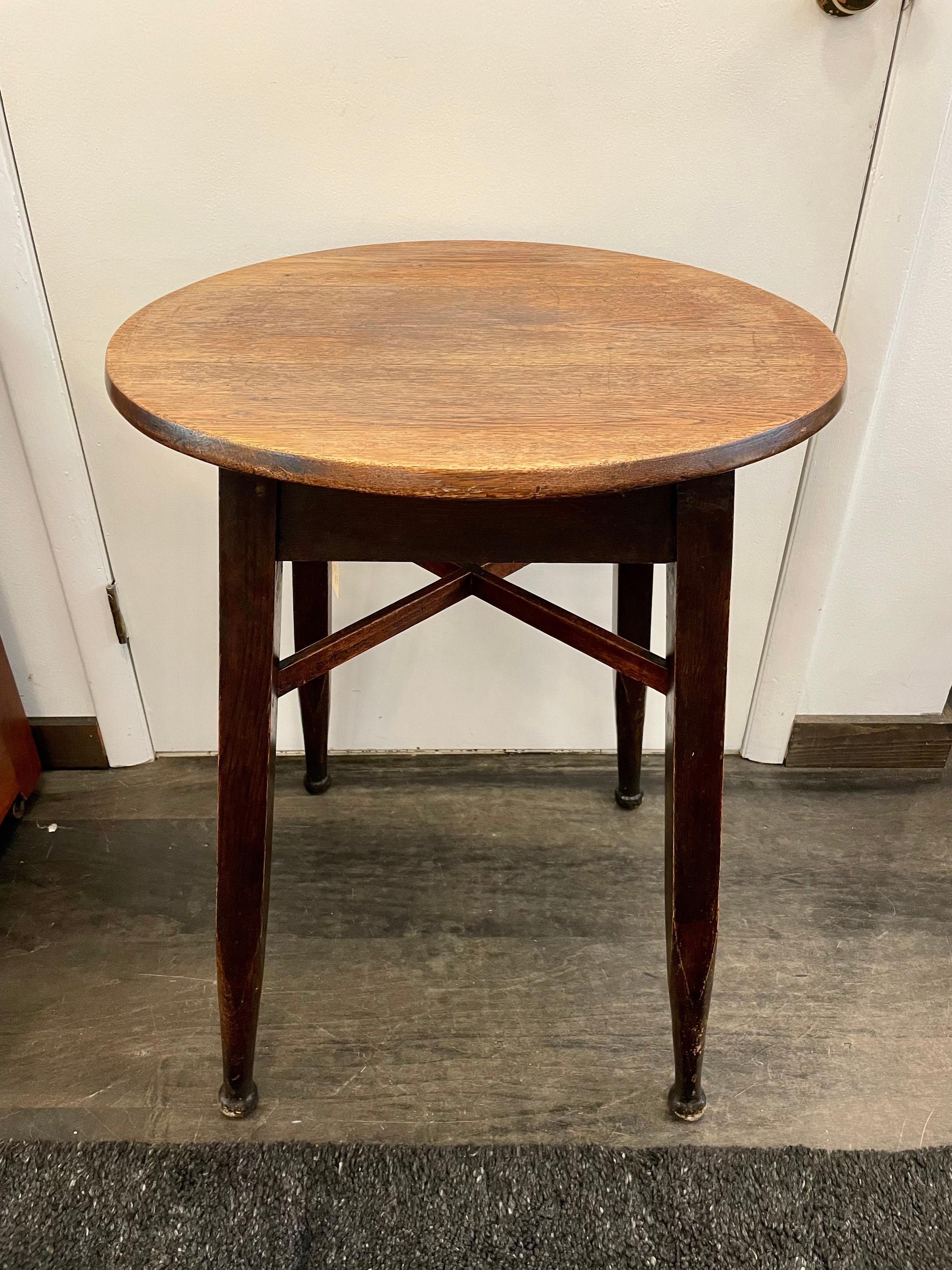 This wonderful occasional table in French oak with four tapering legs and stretchers for stability is worn beautifully from years of loving use and enjoyment.  This is stable and ready to be enjoyed for another 100+ years.