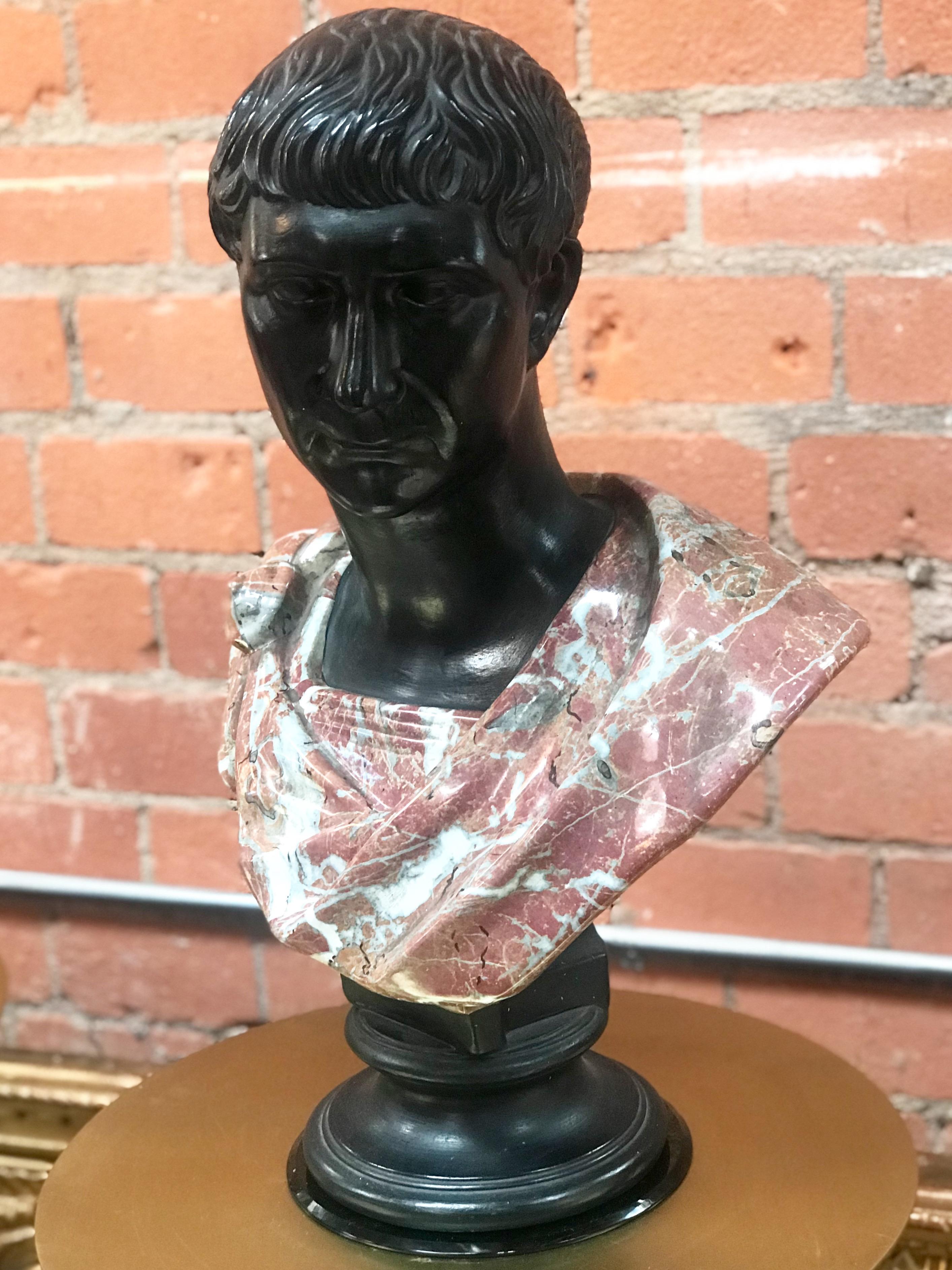 Late 1800s glazed terracotta bust and marble. Nice original patina.
Emperor Augustus Caesar, Roman statesman and military leader, first Emperor of the Roman Empire, captured in an impressive bust: hand-sculpted detail of old well-patina surface,