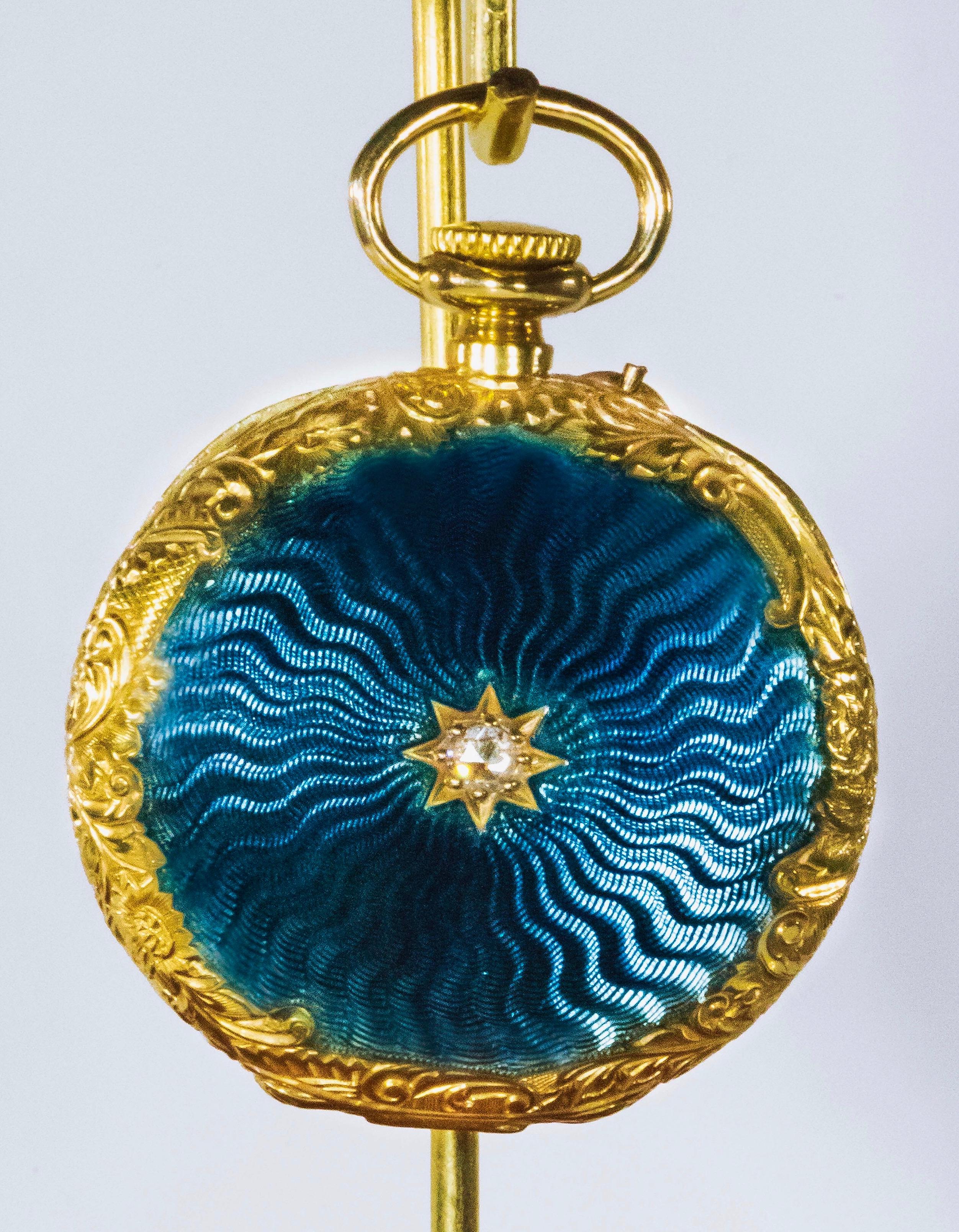 A Late 1800s Patek Philippe Diamond Set Aquamarine Blue Engine Turned Guillouche Enamel with Scalloped Engraved Case design Pocket Watch  
*Fully Signed, Dial, Case & Movement 

Case dimensions: 31mm