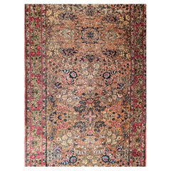 Antique 19th Century Persian Kerman Lavar Runner in an Allover Floral Design in Rust Red