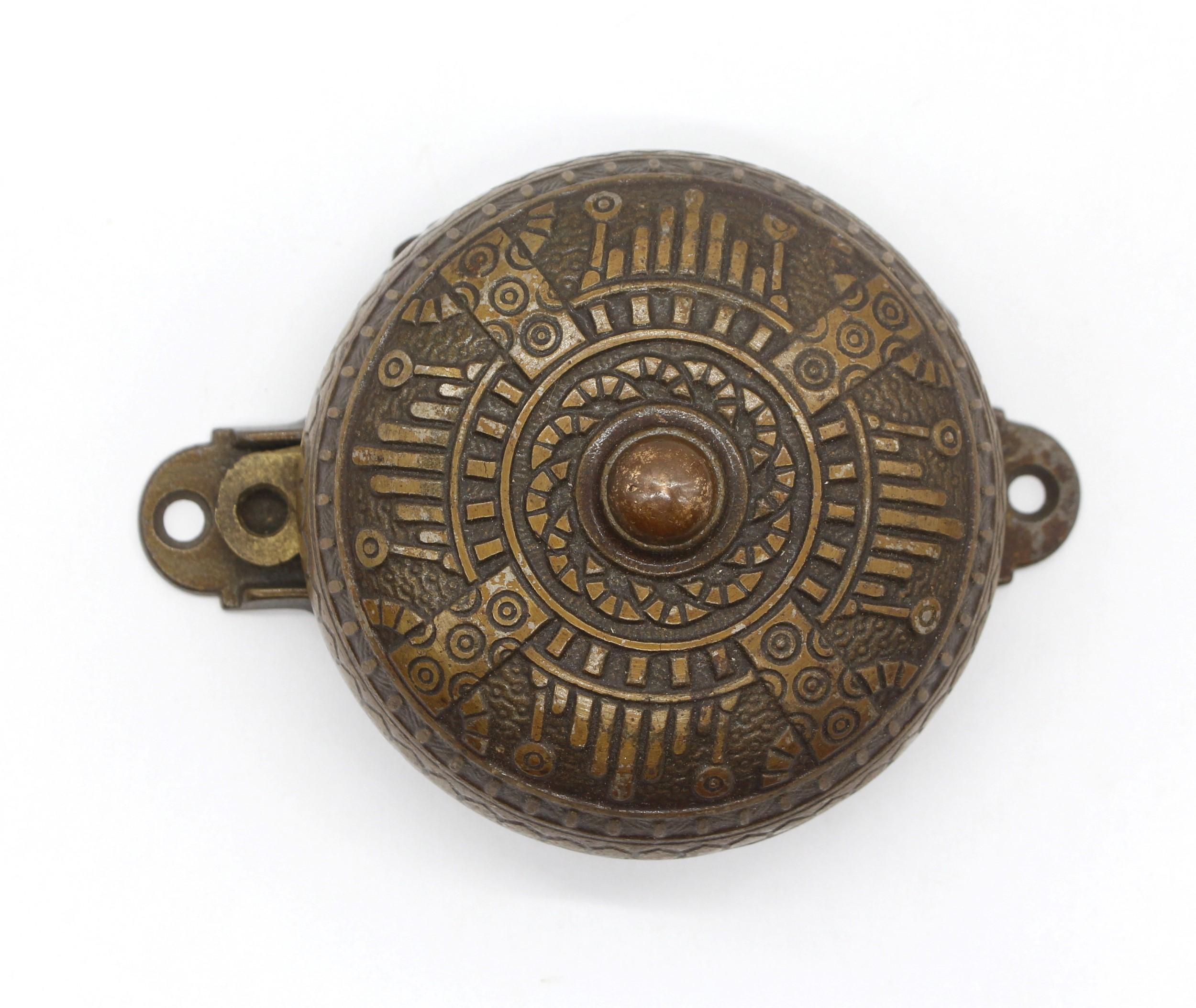 Late 1800s Victorian working doorbell made of cast iron with a bronze wash to enhance it's beauty. The bell itself goes inside the house and the matching bronze lever is installed outside. Operating the lever rings the bell! There is also an