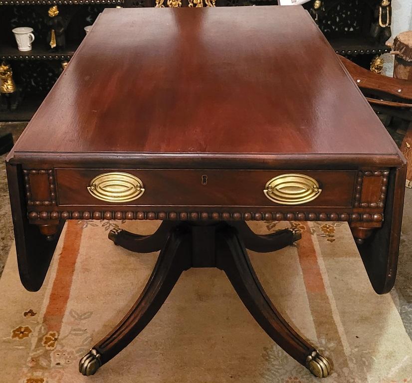 PRESENTING A SUPERB late 18C Scottish Regency Large Pembroke or Library Table.

Made in Britain, circa 1780-1810.

Made of beautifully patinated mahogany.

We can tell that this is an authentic ‘period’ piece and not a reproduction, by the