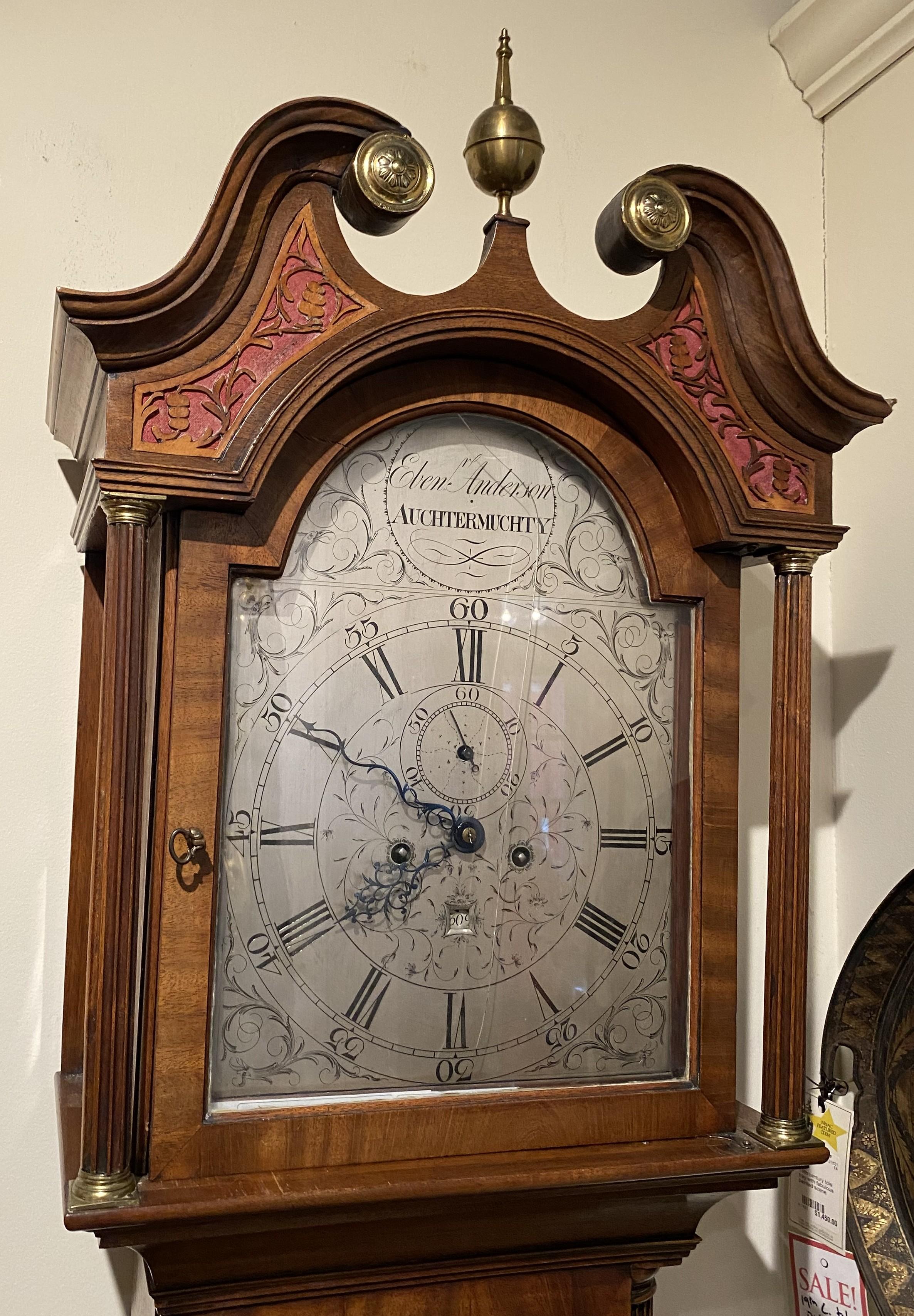 A fine Scottish inlaid mahogany tall clock by Eben (Ebenezer) Anderson, Auchtermuchty, with a swans neck split pediment top with brass rosettes and ball & spire finial, and pierced fretwork. The shaped waist door opens to two weights and a pendulum