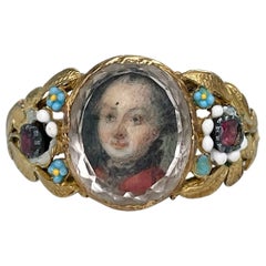 Late 18th Century 18 Karat Gold Man Miniature Portrait Garnet Floral Enamel Ring