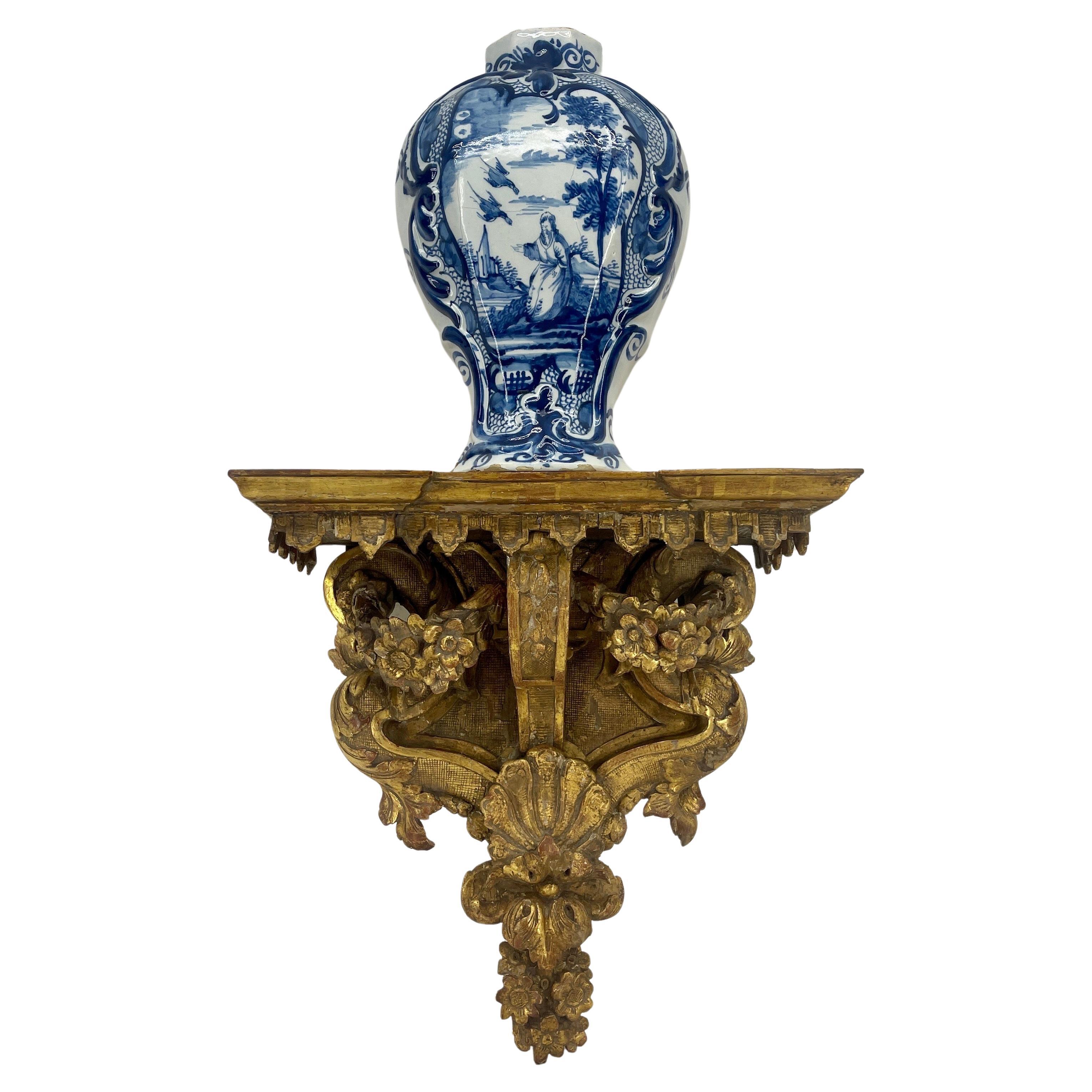 Italian 18th Century Gilded Wood Wall Corbel Shelf

Beautifully constructed gilt wood and ornamented with floral swags and intricate cross hatch pattern throughout. This hand carved gilt piece would be wonderful architectural element standing alone