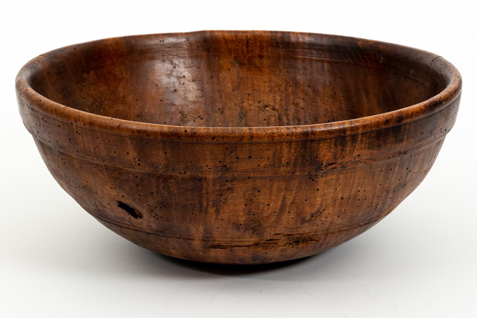 Circa late 18th century bowl in burl and tiger walnut wood. Made in the United States. Please note of wear consistent with antique age.
