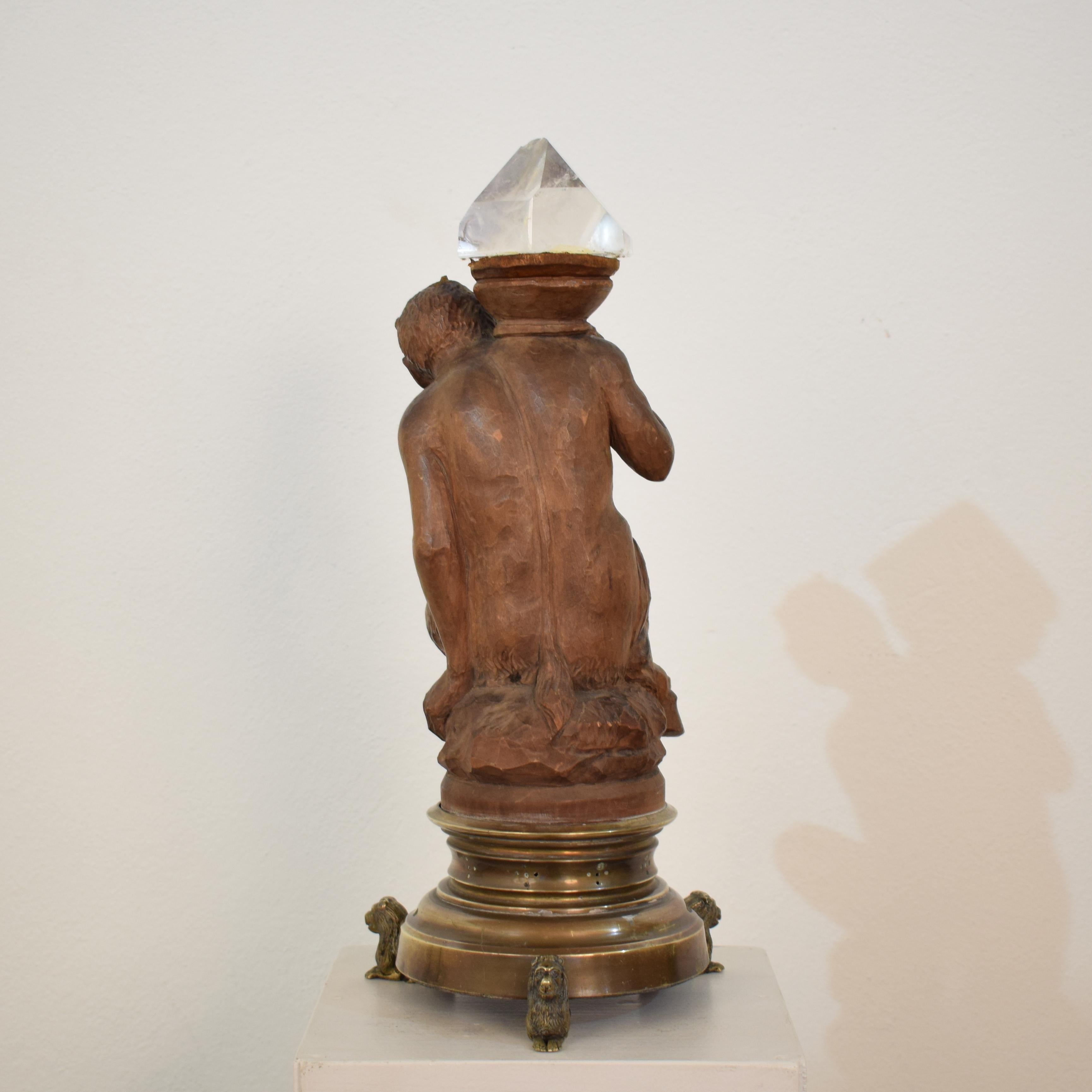 Late 18th Century Carved Faun with a Crystal Stone and a Brass Base with Lions 7