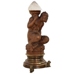 Late 18th Century Carved Faun with a Crystal Stone and a Brass Base with Lions