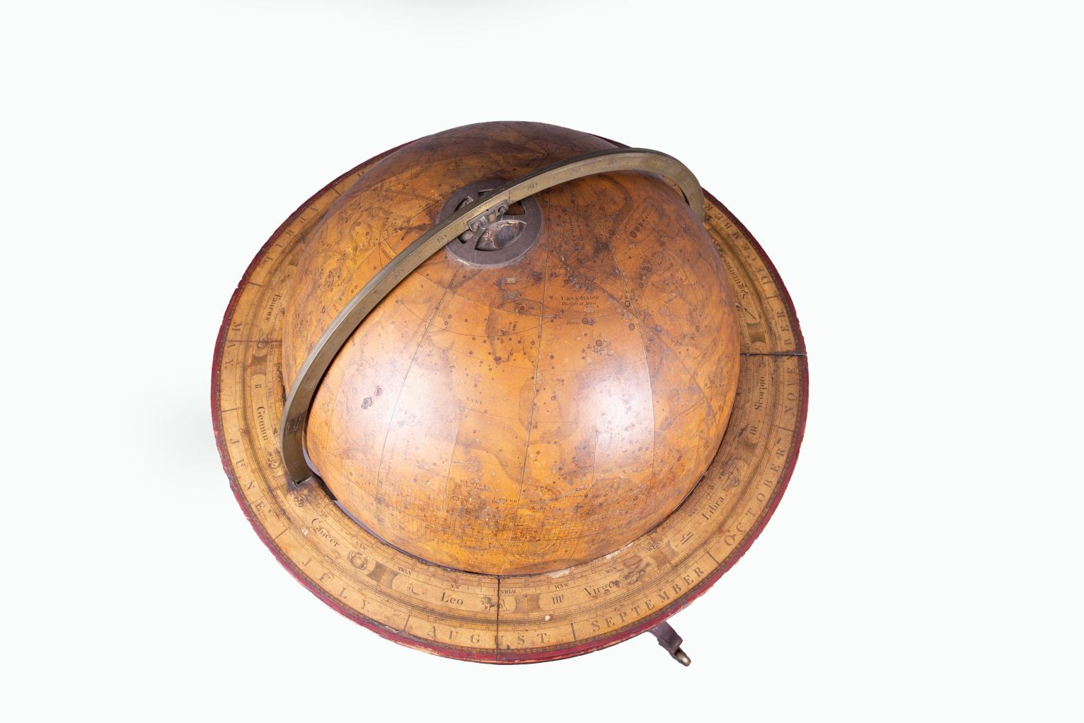 Late 18th century celestial globe on a mahogany tripod stand with brass castors by Nevil Maskelyne DD, FRS.   Sold by WS Jones, Holborn London.