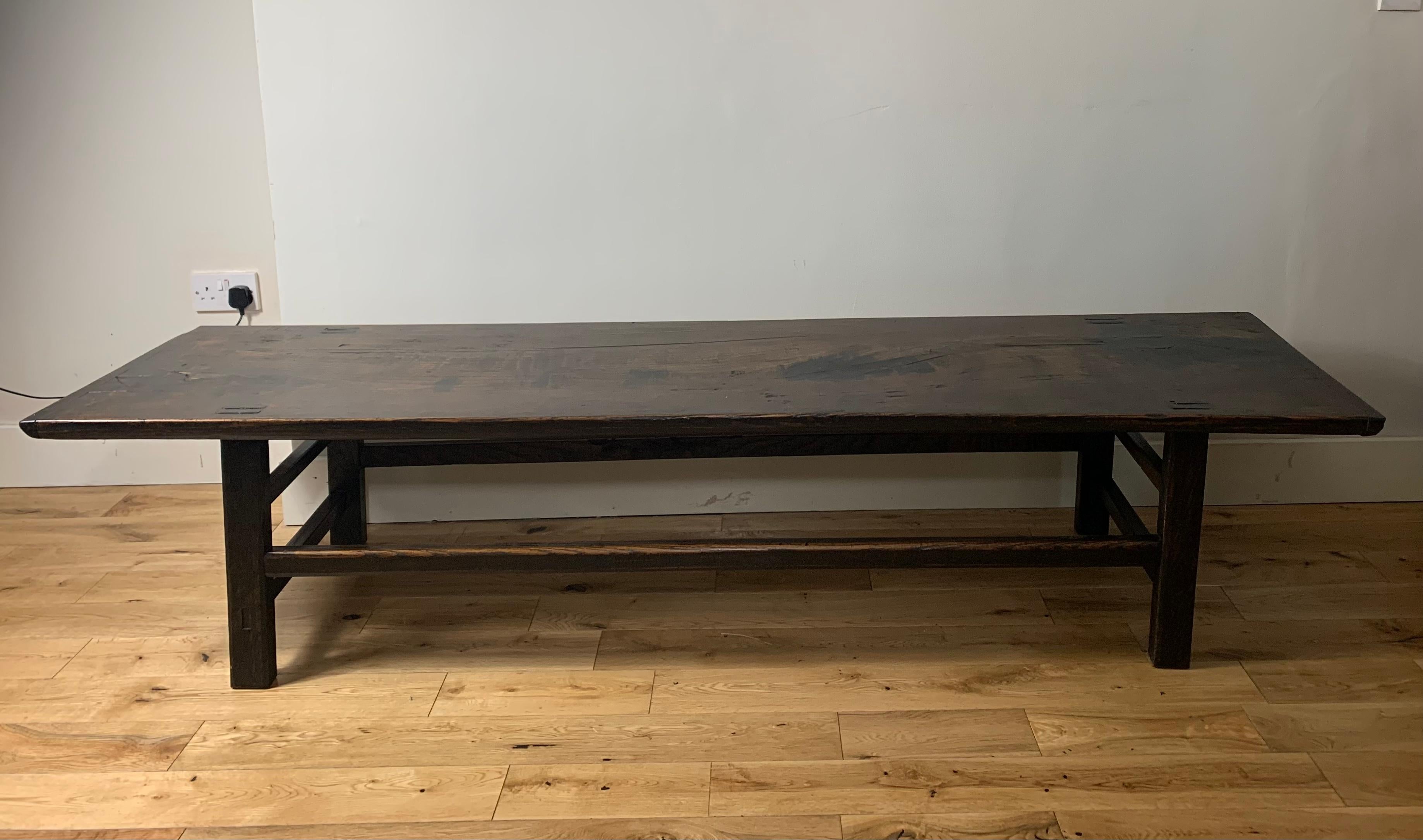 Chinese , Low Table  / Daybed dating to the latter part of the 18th century . 

Solid elm wood , generous proportions , traditional design, solid thick single plank top with cleated ends , mortise and tenon construction. Wonderful colour and amazing