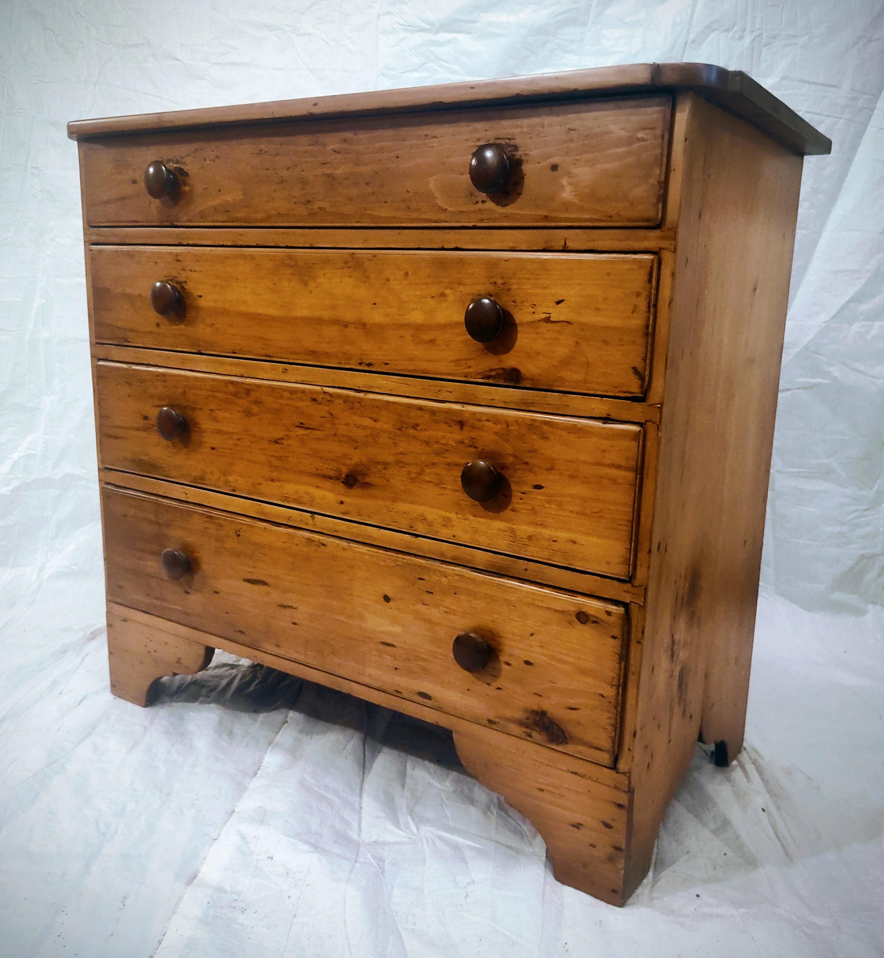 Late 18th Century Country Pine four drawer chest. This chest is packed full of country charm but also displays some more sophisticated design elements such as the Queen Ann inspired base and the cut cornered top detail, as well as the scratch beaded