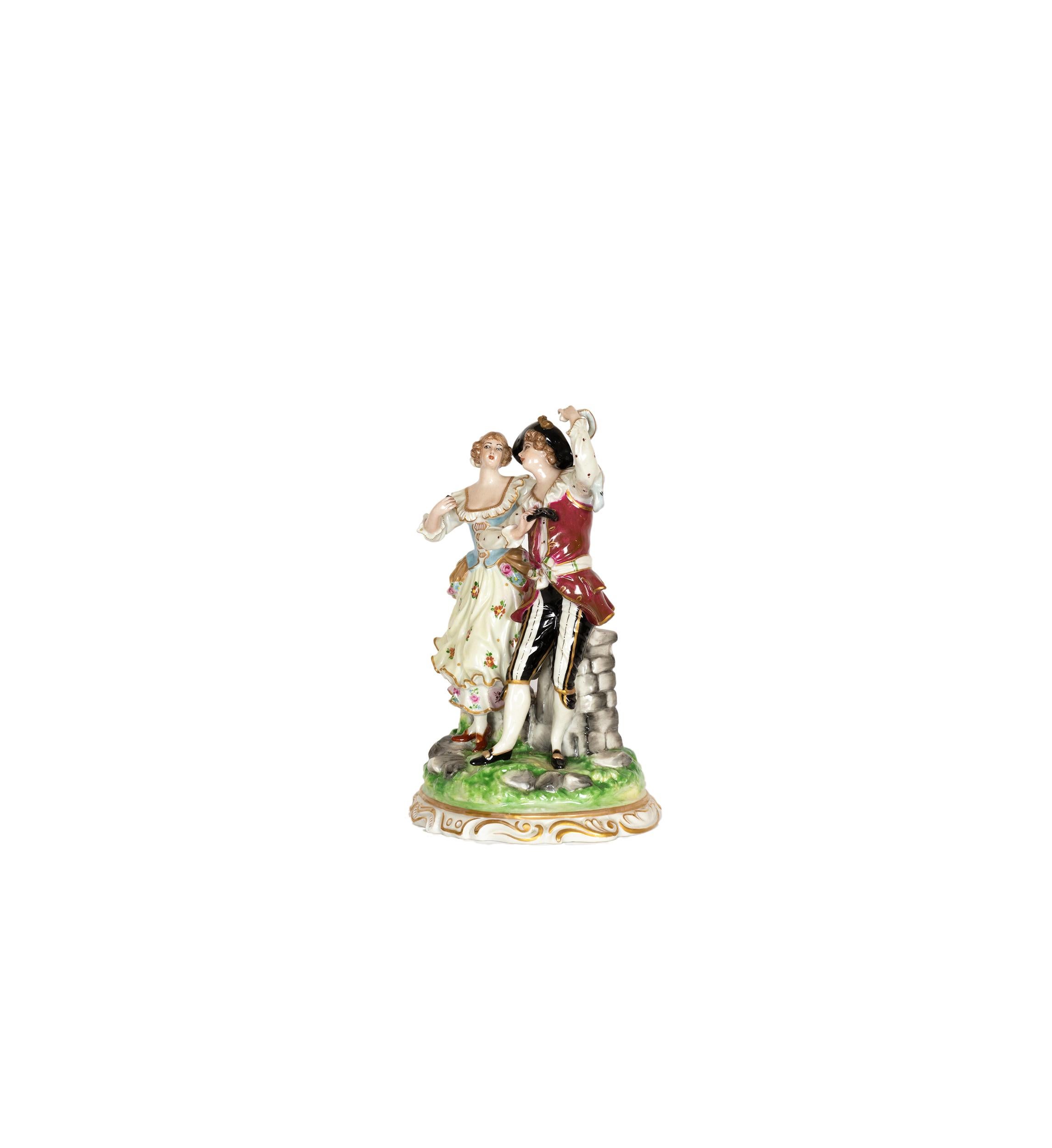 A charming translucent soft-paste german porcelain figurine of a dancing couple of the Volkstedt, Muller & Co, Dresden manufacturing of the late 18th century, mark on the base


