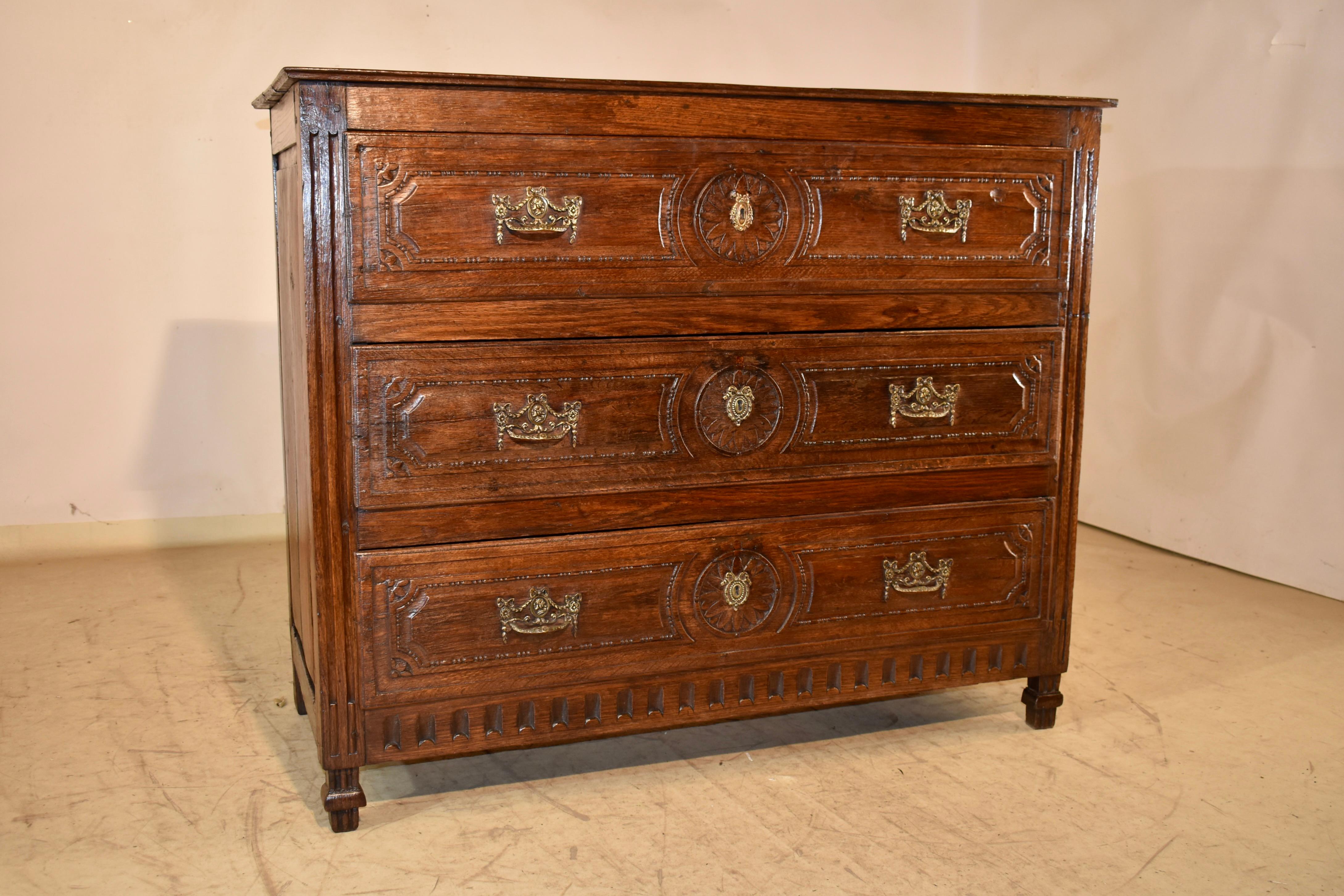 Wonderful late 18th century Director commode in oak.

This commode is of excellent scale.  the top is made from three planks, and follows down to raised paneled sides for added design interest from any point of reference.  

In the front of the
