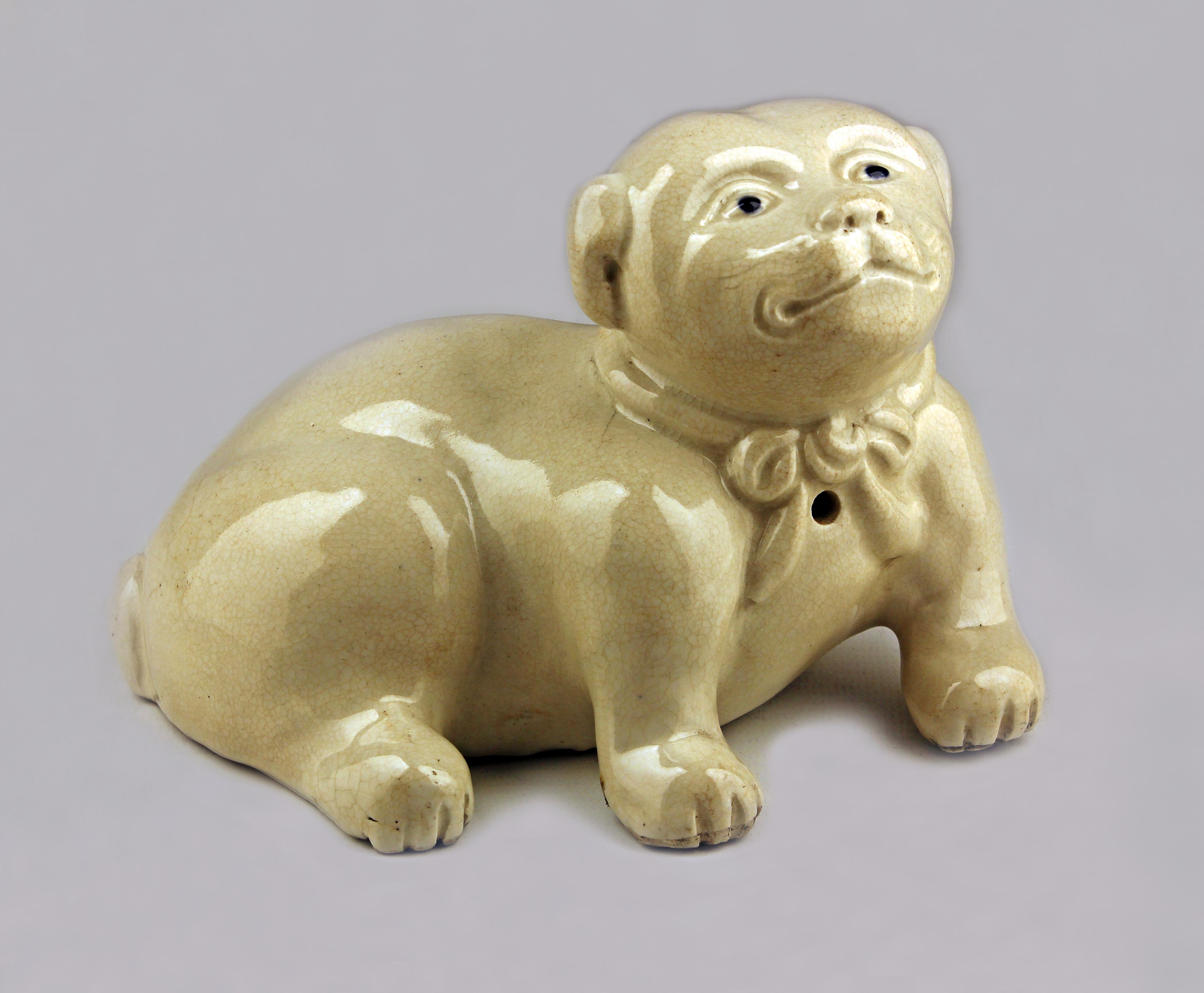 Late 18th century/Edo-Meiji period japanese glazed porcelain sculpture of a dog

By: unknown
Material: porcelain
Technique: molded, pressed, glazed
Dimensions: 5.5 in x 7.5 in x 5
Date: late 18th century
Style: Edo, Meiji
Place of origin: