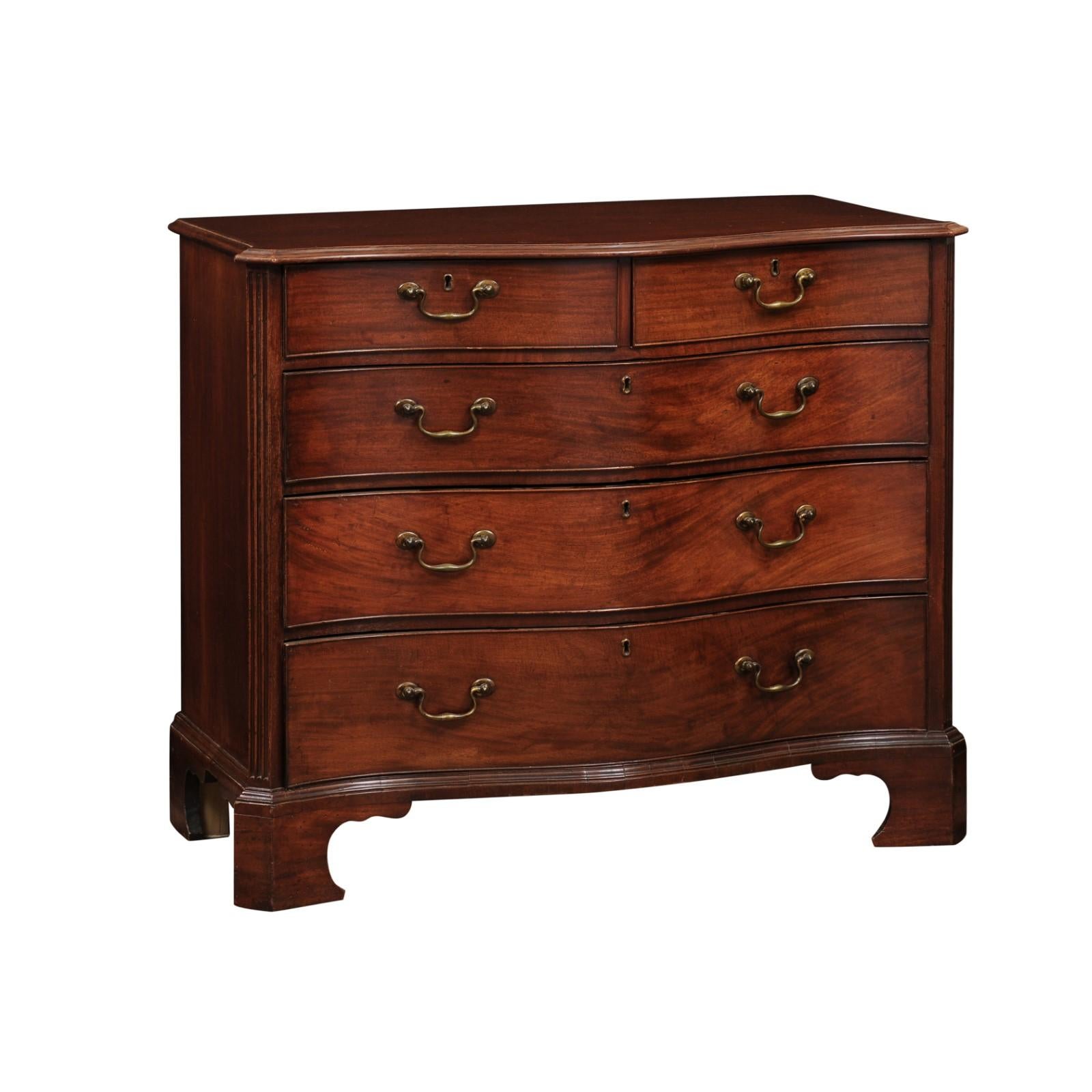 Late 18th Century English George III Mahogany Serpentine Chest with 5 Drawers, Fluted Canted Sides & Bracket Feet