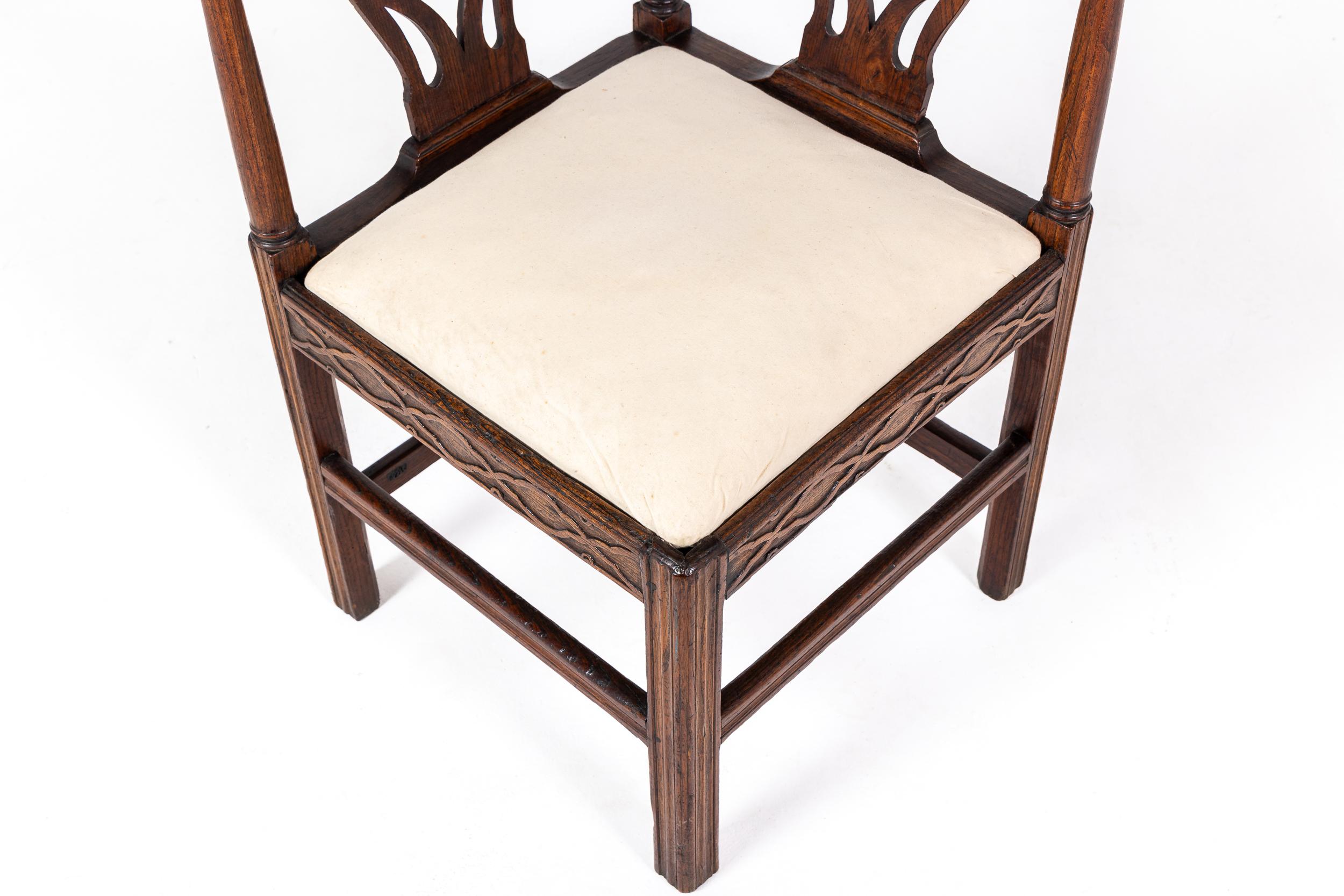 An Interesting Late 18th Century English Oak Corner Chair.

Designed in such a way that they could be tucked away in to a corner when not in use, the corner chair is one of the rarer examples of Georgian furniture. This particular example has the