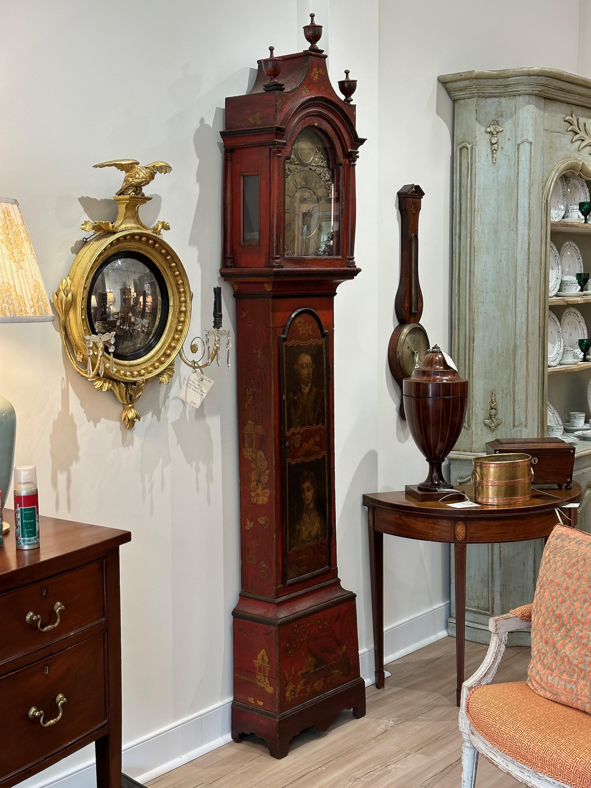 A lovely and unusual late 18th century. English elegantly proportioned tall case clock in scarlet chinoiserie with an elaborately engraved brass dial signed 