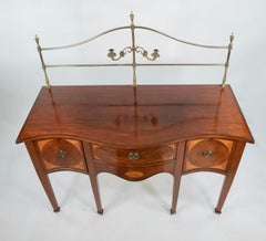 Late 18th Century English Serpentine Hepplewhite Sideboard with Brass Gallery