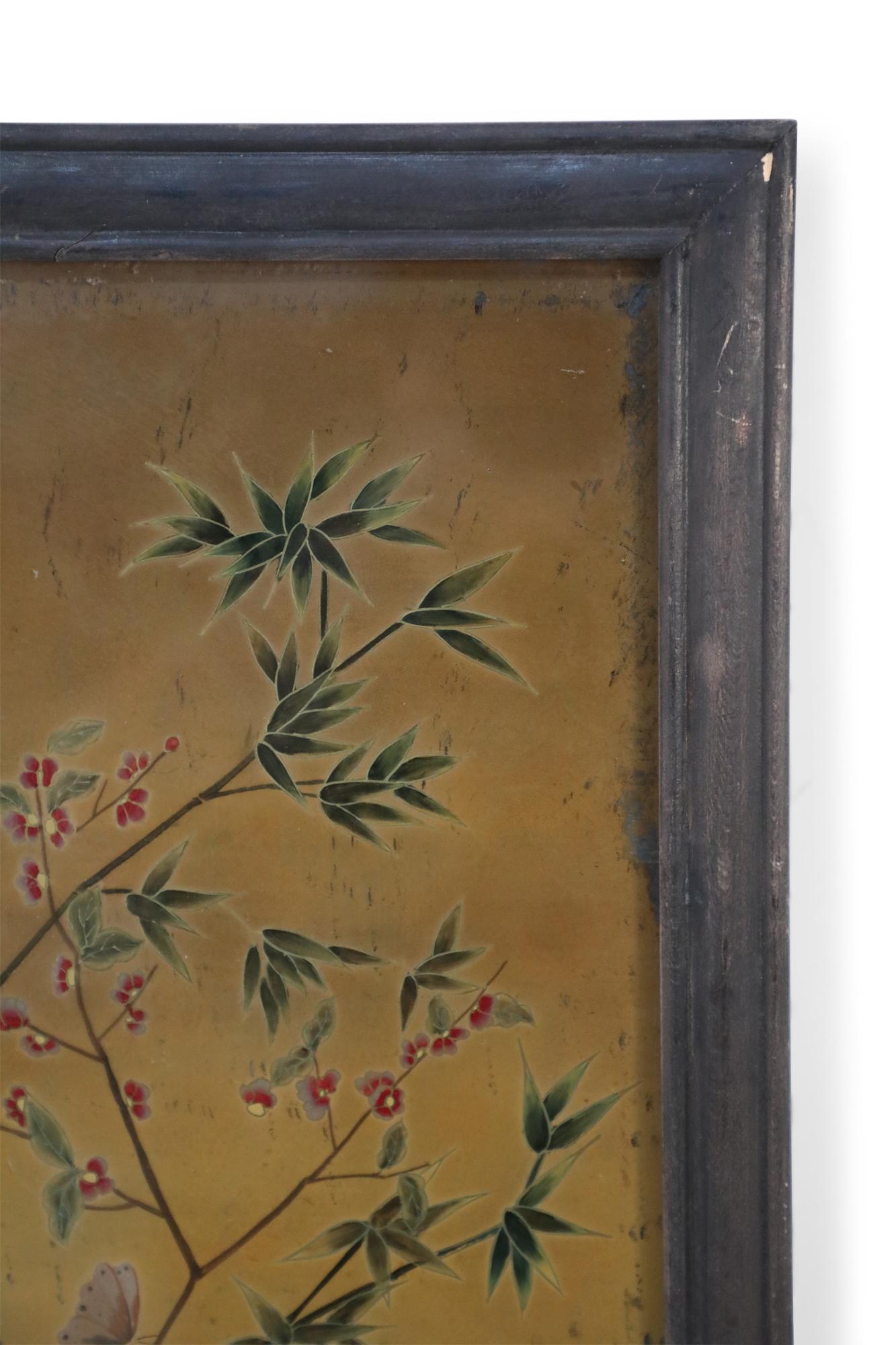 Chinese (18th/19th century) framed glass back painting depicting a family beneath two flowering trees surrounded by birds and butterflies in a wooden frame with decorative metal top hanging hook (Companion piece: NWL2515).