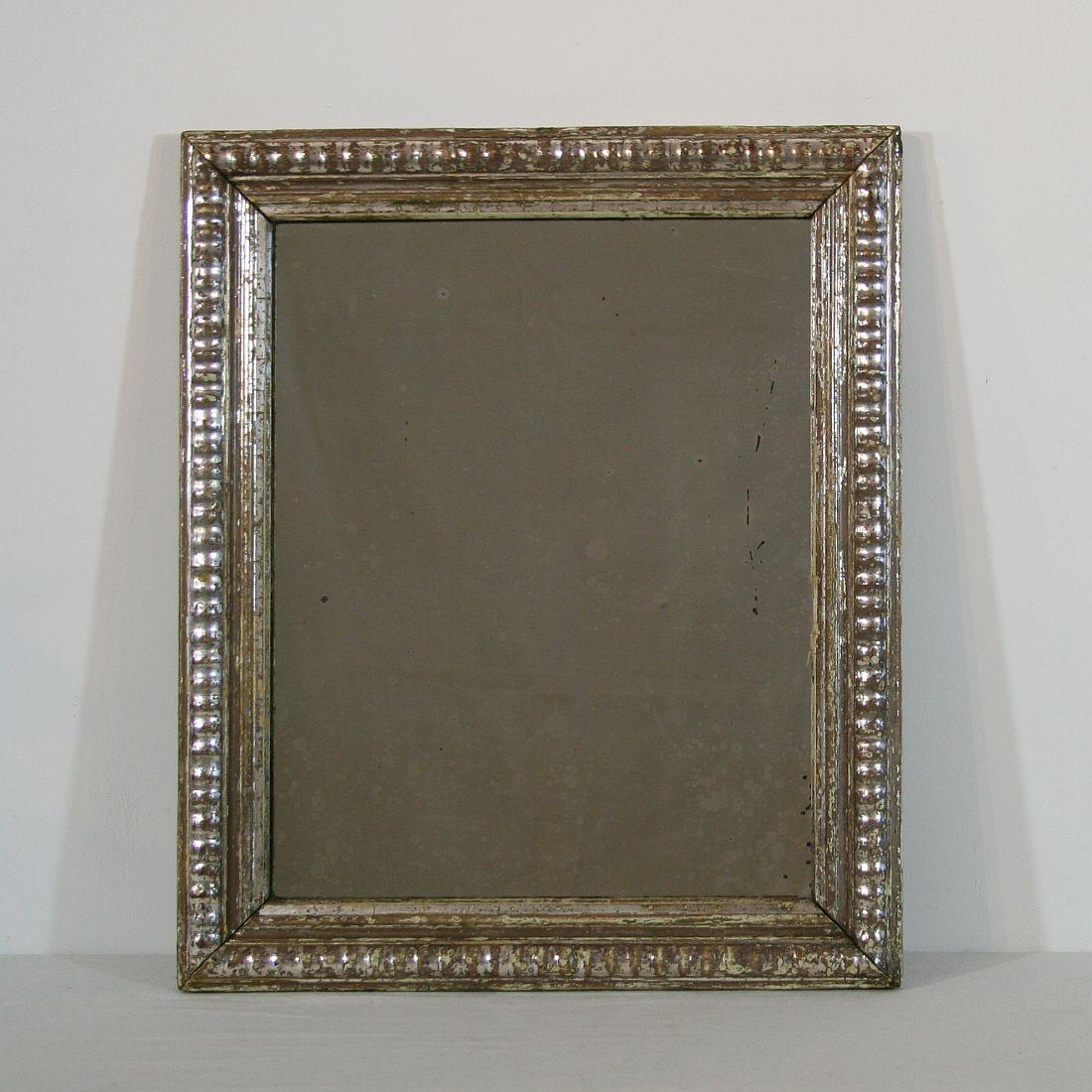 Beautiful silvered mirror from the 18th century
France, circa 1780. Small losses, but despite of its high age in a relative good condition.