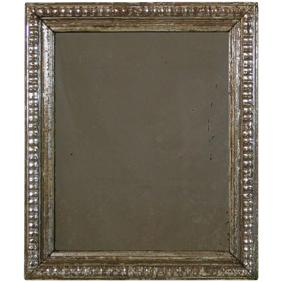 Late 18th Century French Carved and Silvered Mirror